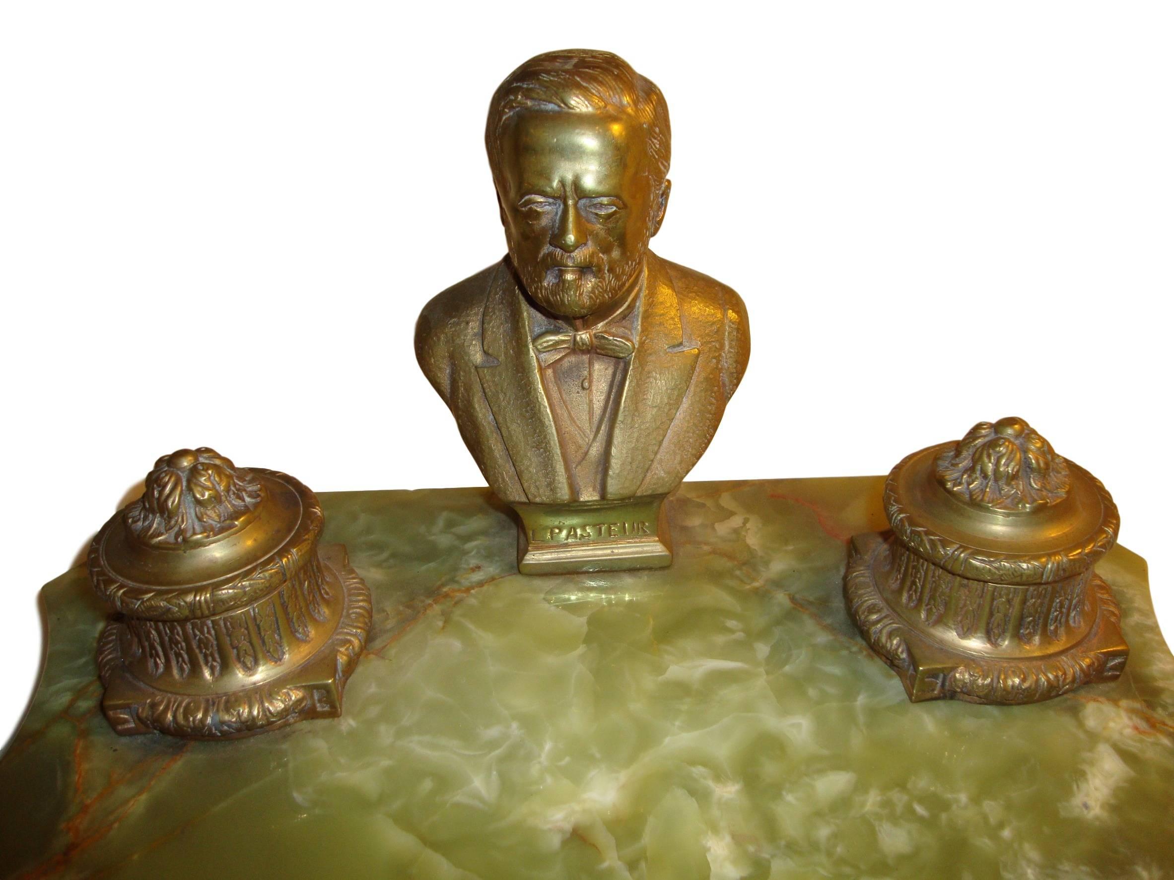 Onyx and bronze inkwell desk set depicting Louis Pasteur. A nicely cast bronze with double ink holders on an onyx pen and pencil base.