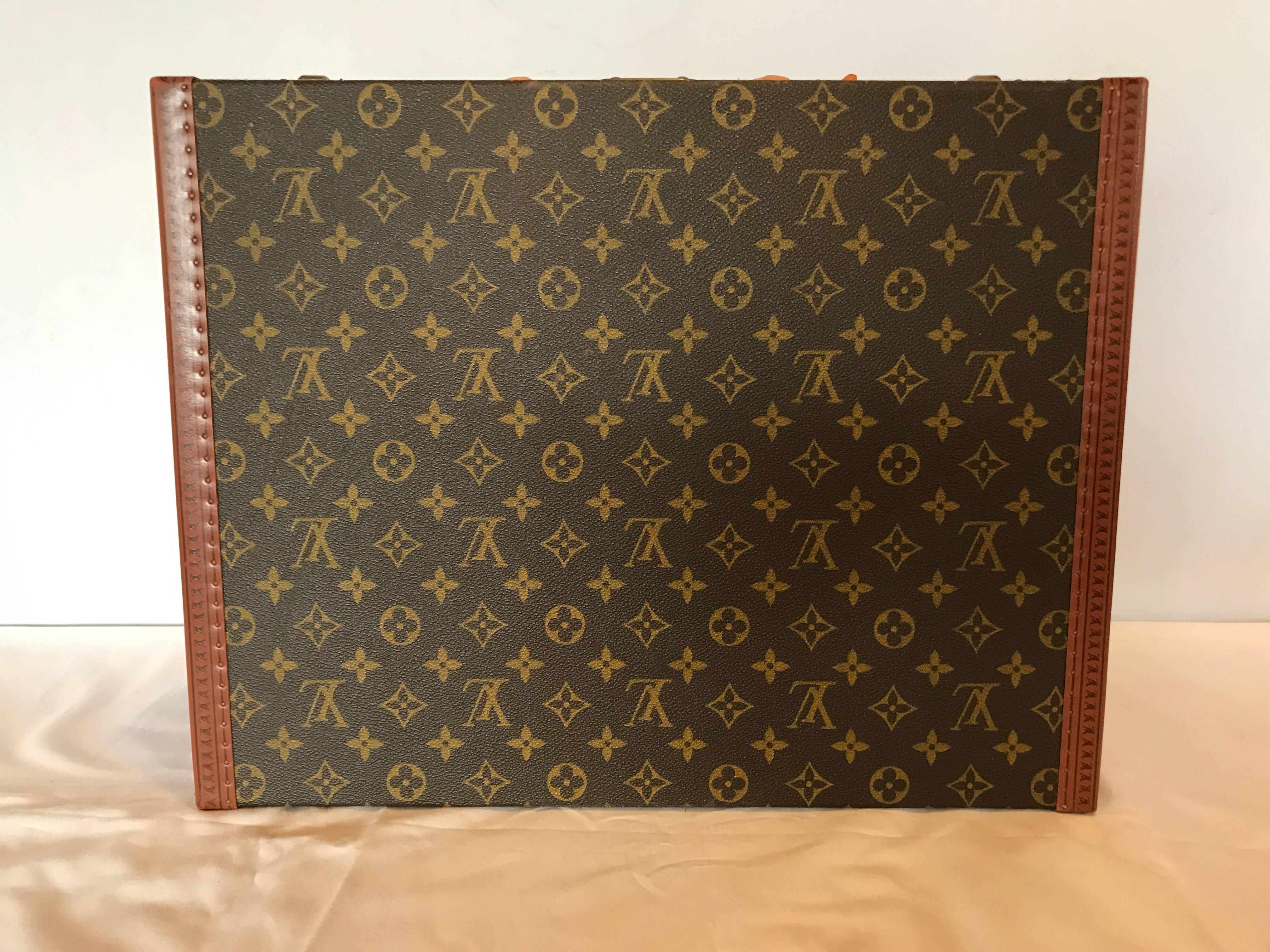 Louis Vuitton Monogram hard sided suitcase, 20th century, no. 912291, US Custom stamp, marked 