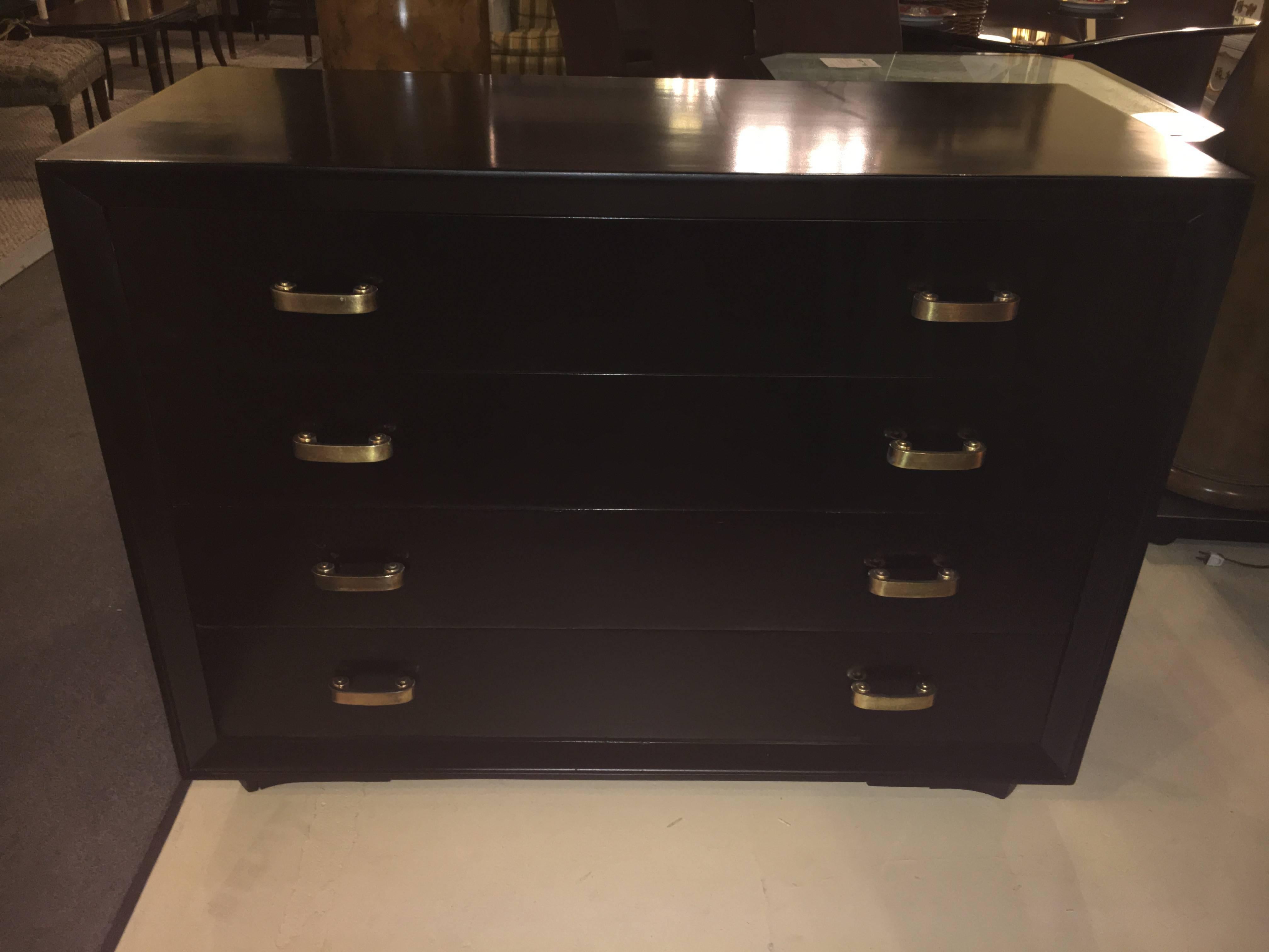 Fine Hollywood Regency Berkey and Gay custom pair of chests in ebony finish. Fine large pair of commodes having all oak secondaries having recently been redone to a pristine finish. Each having four large drawers sitting on bracket feet.