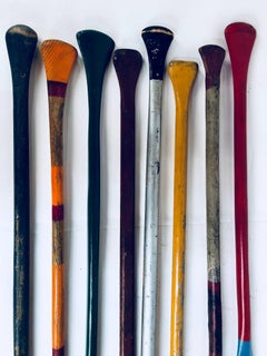 Collection of Eight Antique Wooden Canoe Paddles with Original Painted Surfaces