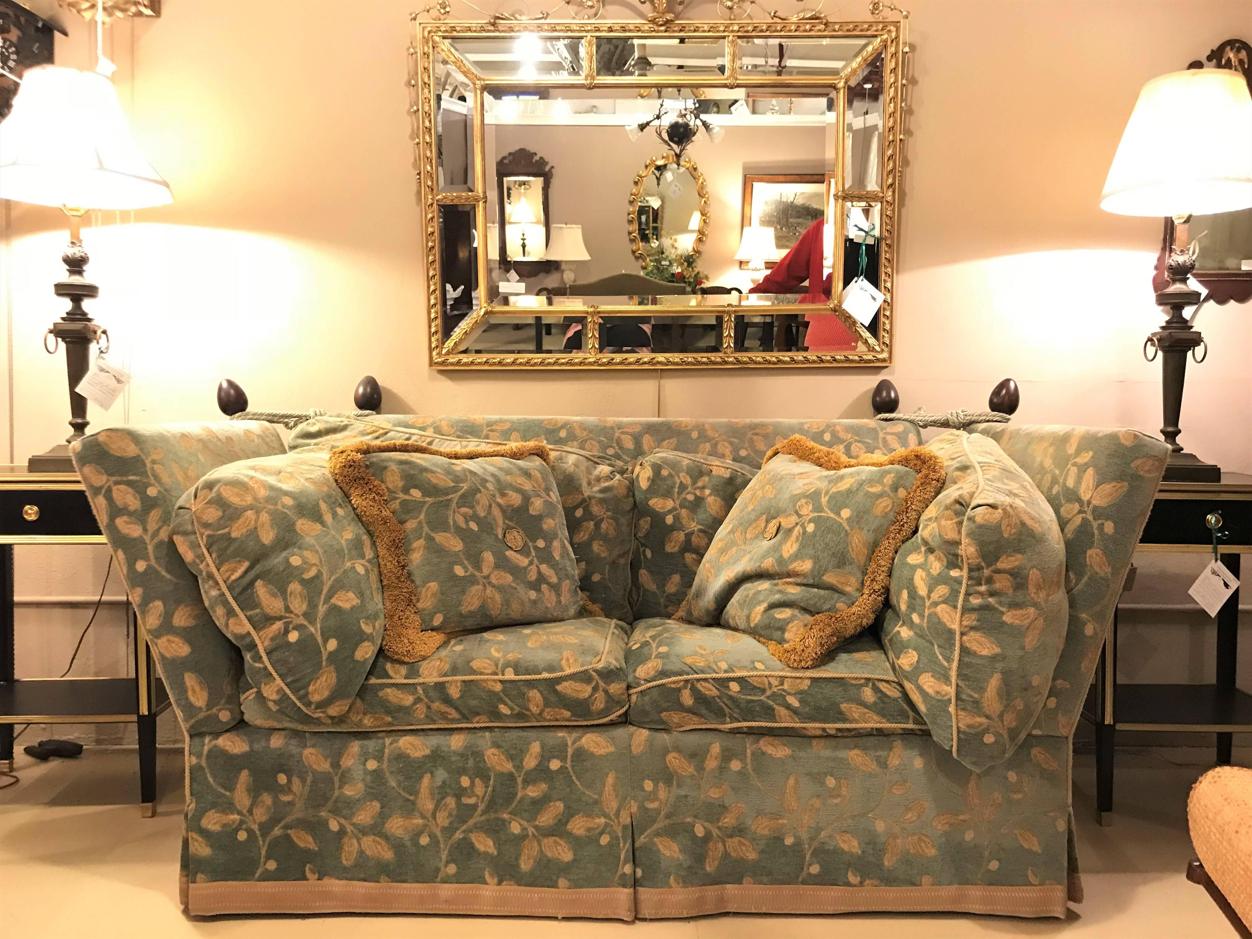 A Knole sofa daybed. This sofa is in good condition and comes with a large variety of custom pillows and throws.