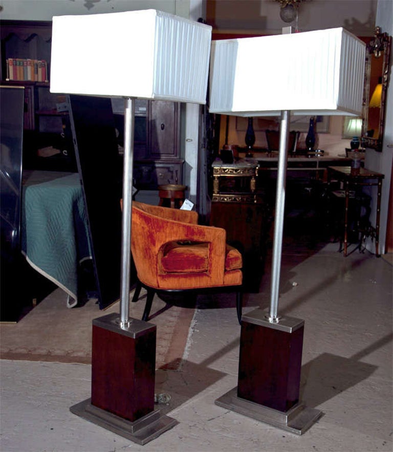 Pair of Mid-Century Modern floor lamps, wood block base and chrome Stand, come with white linen square drum shades.