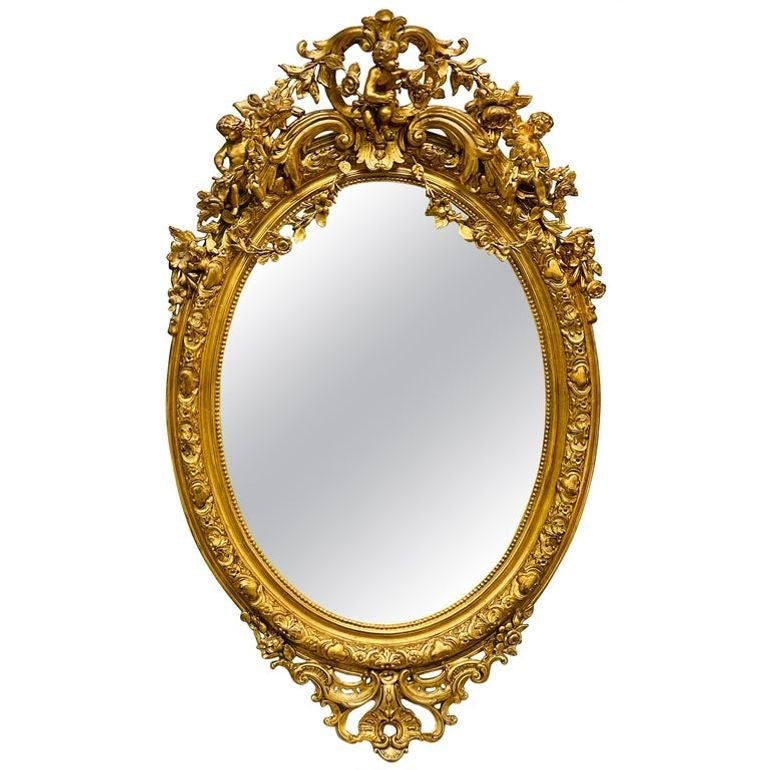 19th Century Palatial Giltwood Wall or Console Mirror Adorning Three Cherubs For Sale