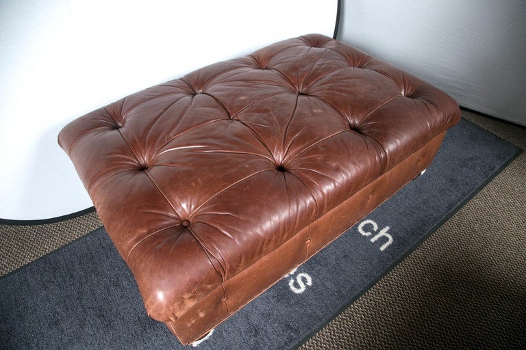Ralph Lauren Leather Storage Ottoman / Bench.  Fabulously Fluffy Leather Tufted Ottoman lined with stripped interior fabric.  Great for storage of pillows/blankets, shirts/socks or any other miscellaneous items.  Inspired by the early 20th-century