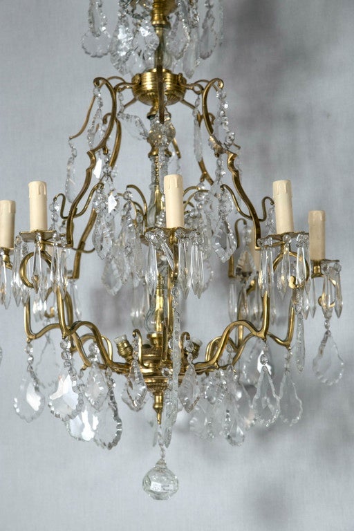 Baroque Pair of Bronze and Crystal Column Form Chandeliers