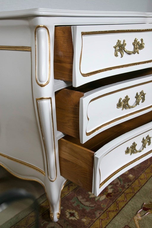 American White And Gilt Paint Lacquered Louis XV Style Bombe Nine Drawer Dresser