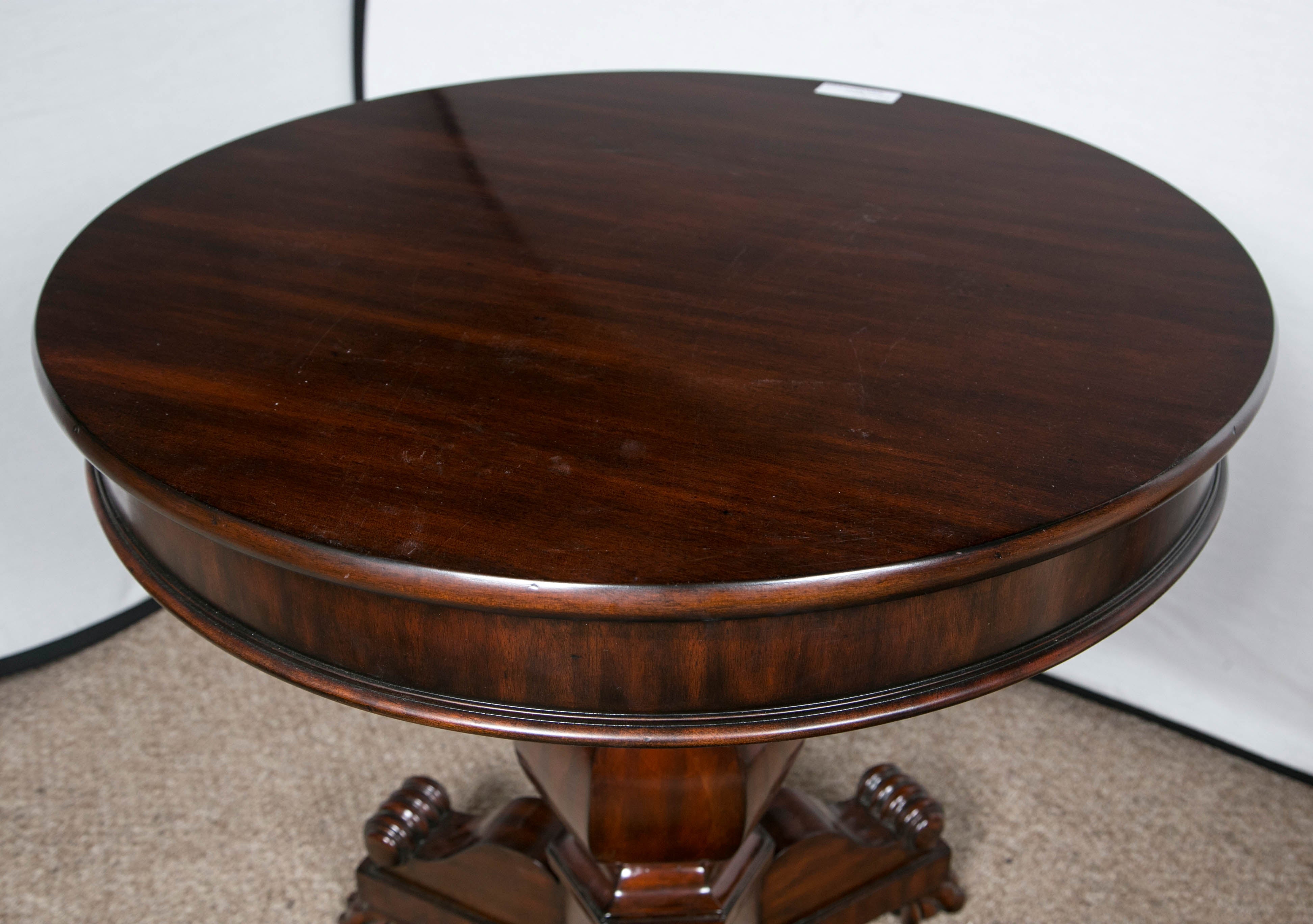 Ralph Lauren New Bohemian pedestal bedside table. An urn shaped pedestal base on this round Empire mahogany end table.

Retail; $3,465.

Recently acquired from a container purchased directly from the showroom. Ralph Lauren Home Furnishings are