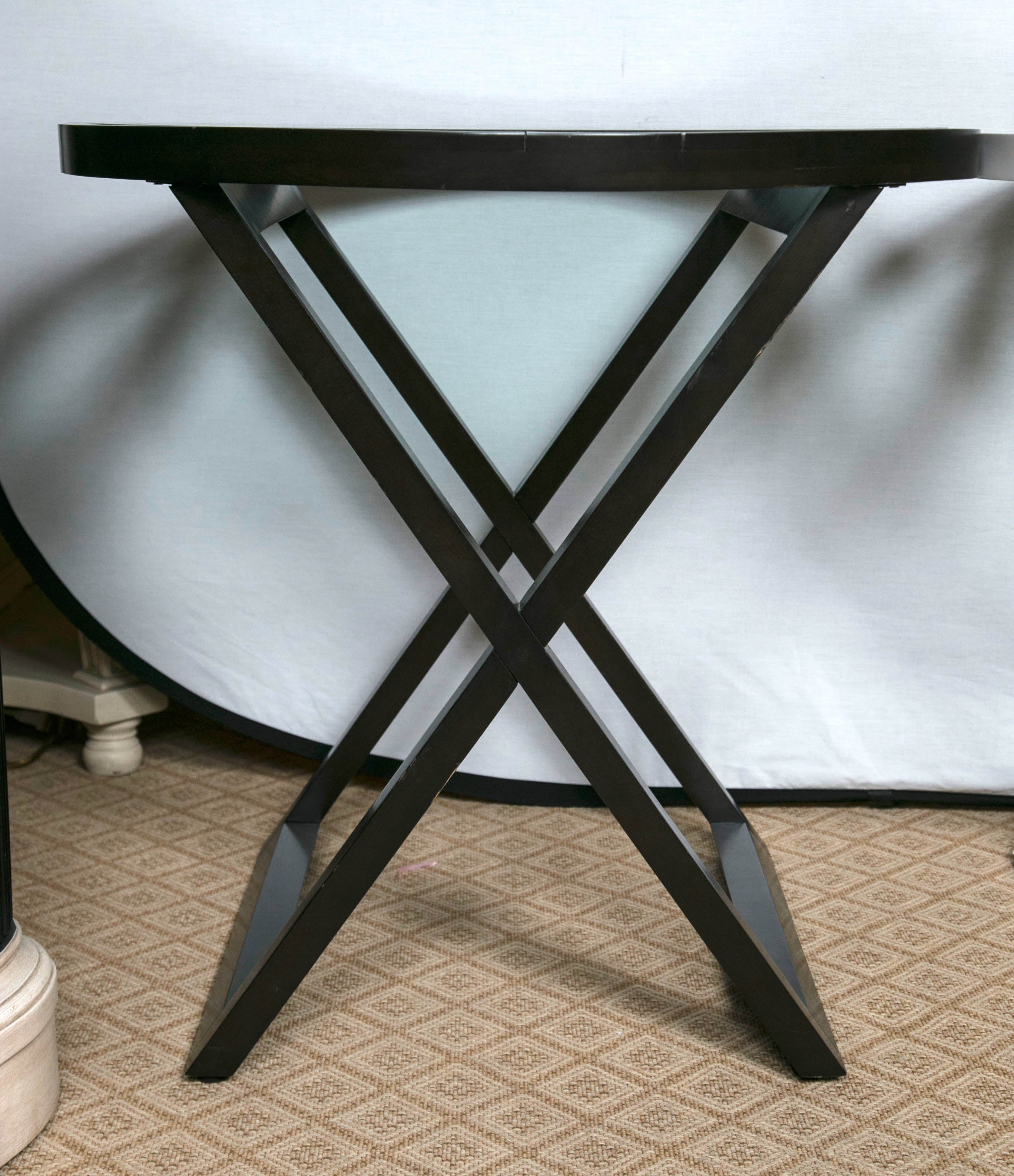Compatable Black Ralph Lauren Mercer Street Lacquered Table. The glass top allows for an open feel. A bistro or a lamp table it's up to you. By Ralph Lauren. 
