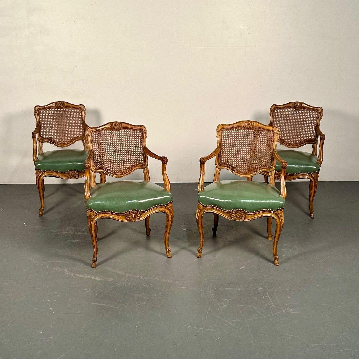 Four French Louis XVI Style Fauteuils / Lounge or Office Chairs, Cane and Leather
 
A stunning set of four chairs, can purchase only a pair if only a pair are required. Each having cane backrests with think plush green tacked leather seats. The