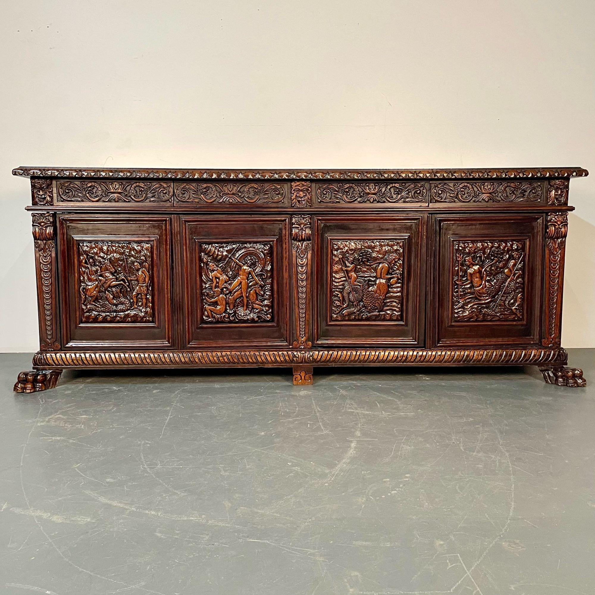Monumental Renaissance Revival Sideboard, Heavily Carved, Mahogany, Branded

A simply stunning ornately carved cabinet telling a story of mermaids, warriors and mythological figures. A monumental renaissance revival sideboard like none other.