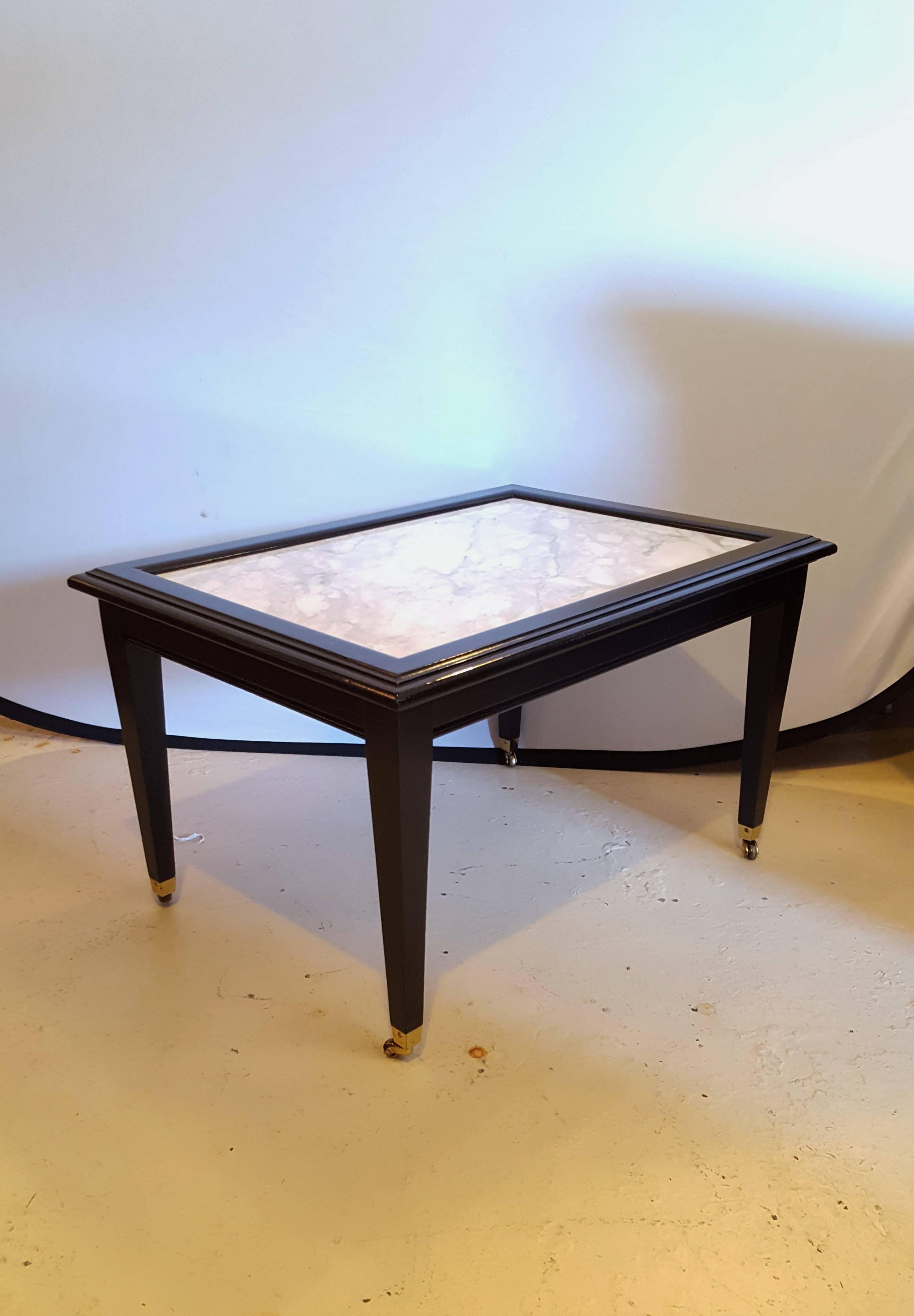 Ebonized Marble Top Coffee Table / Cocktail Table On Wheels manner of Jansen In Good Condition For Sale In Stamford, CT