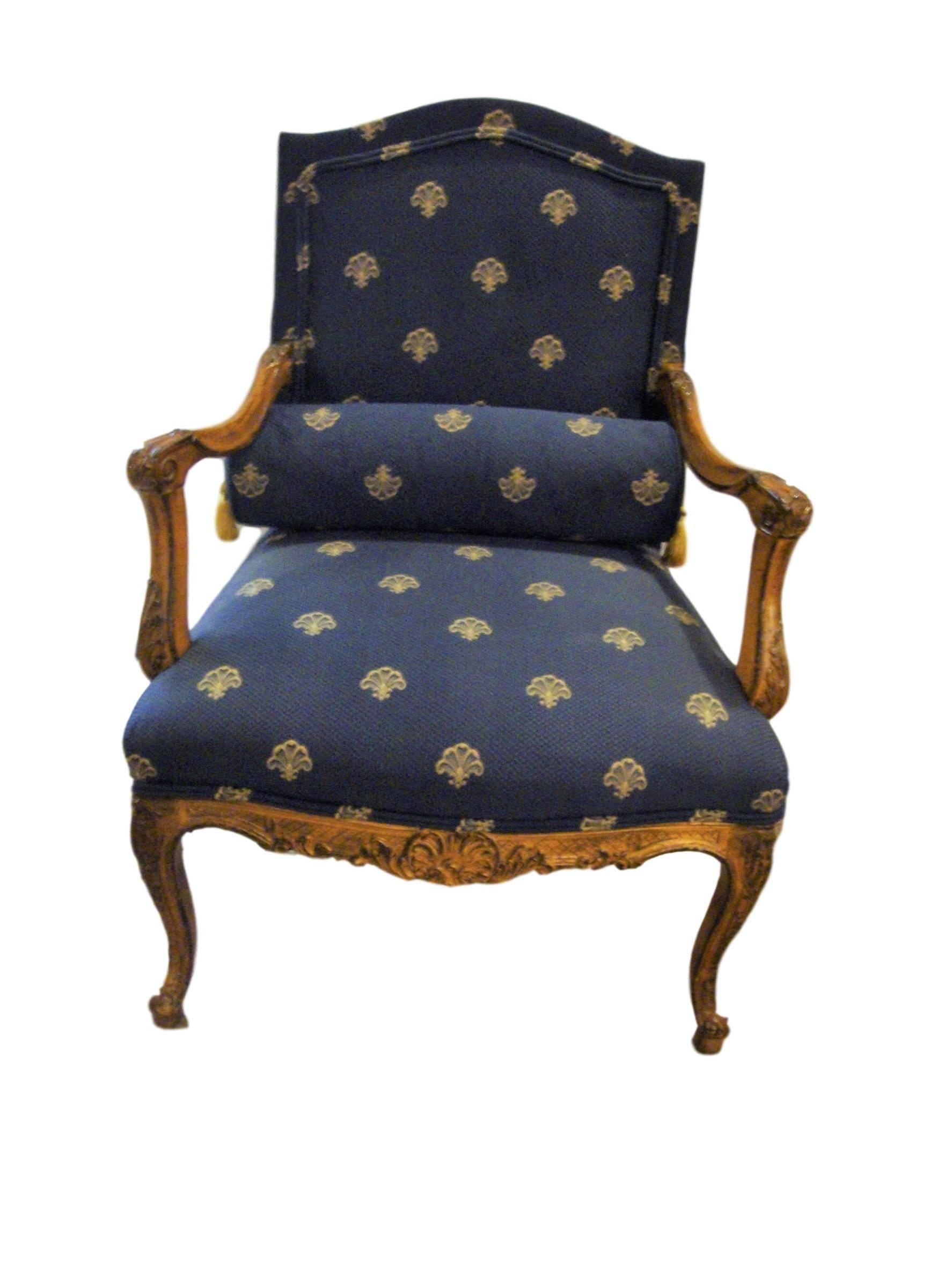 Pair of custom Louis XV style armchairs, finely carved frames and with pillows.

Seat height: 18 inches.