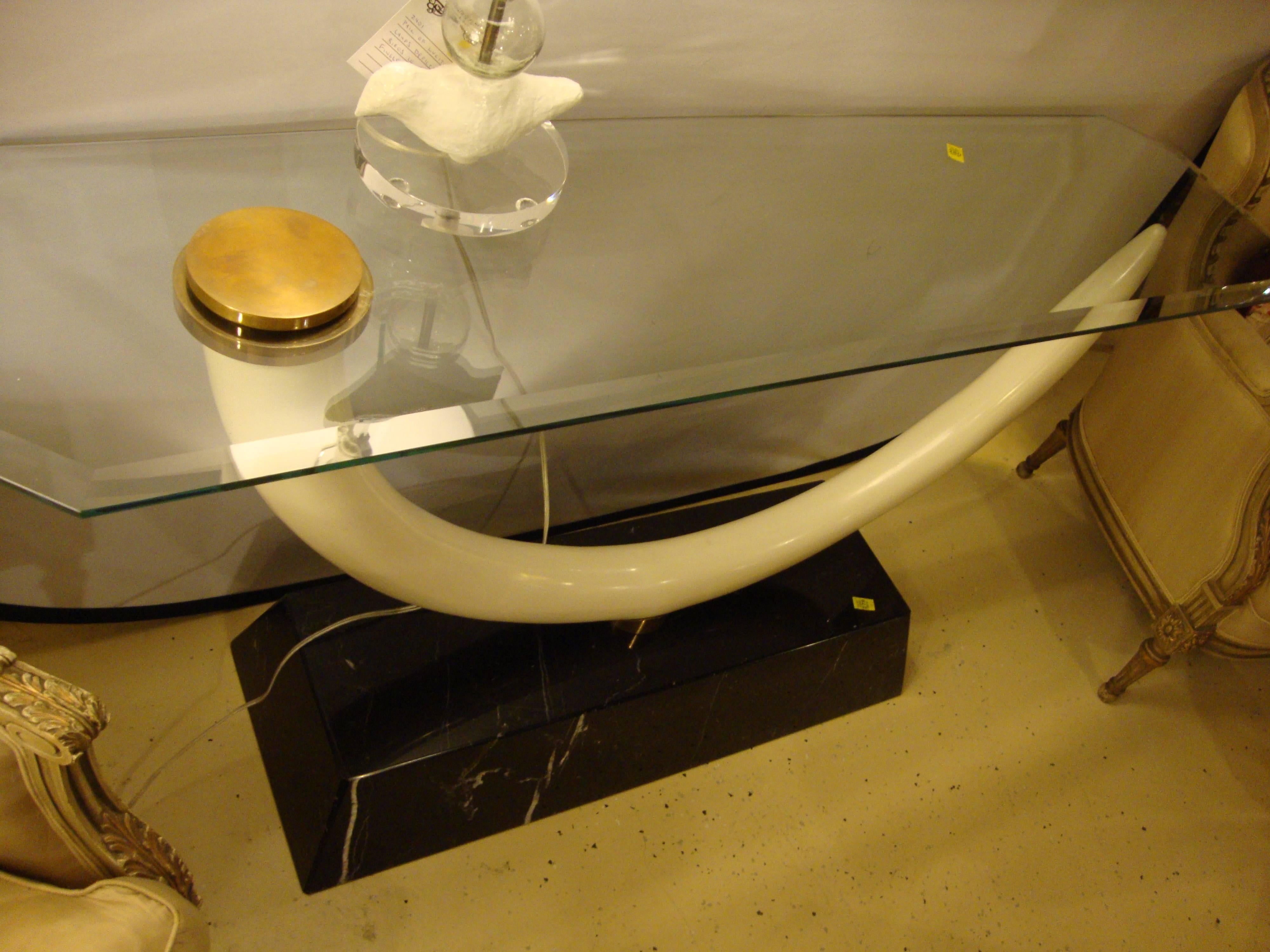 Elephant tusk glass top and marble based console table. Very clean and sharp.