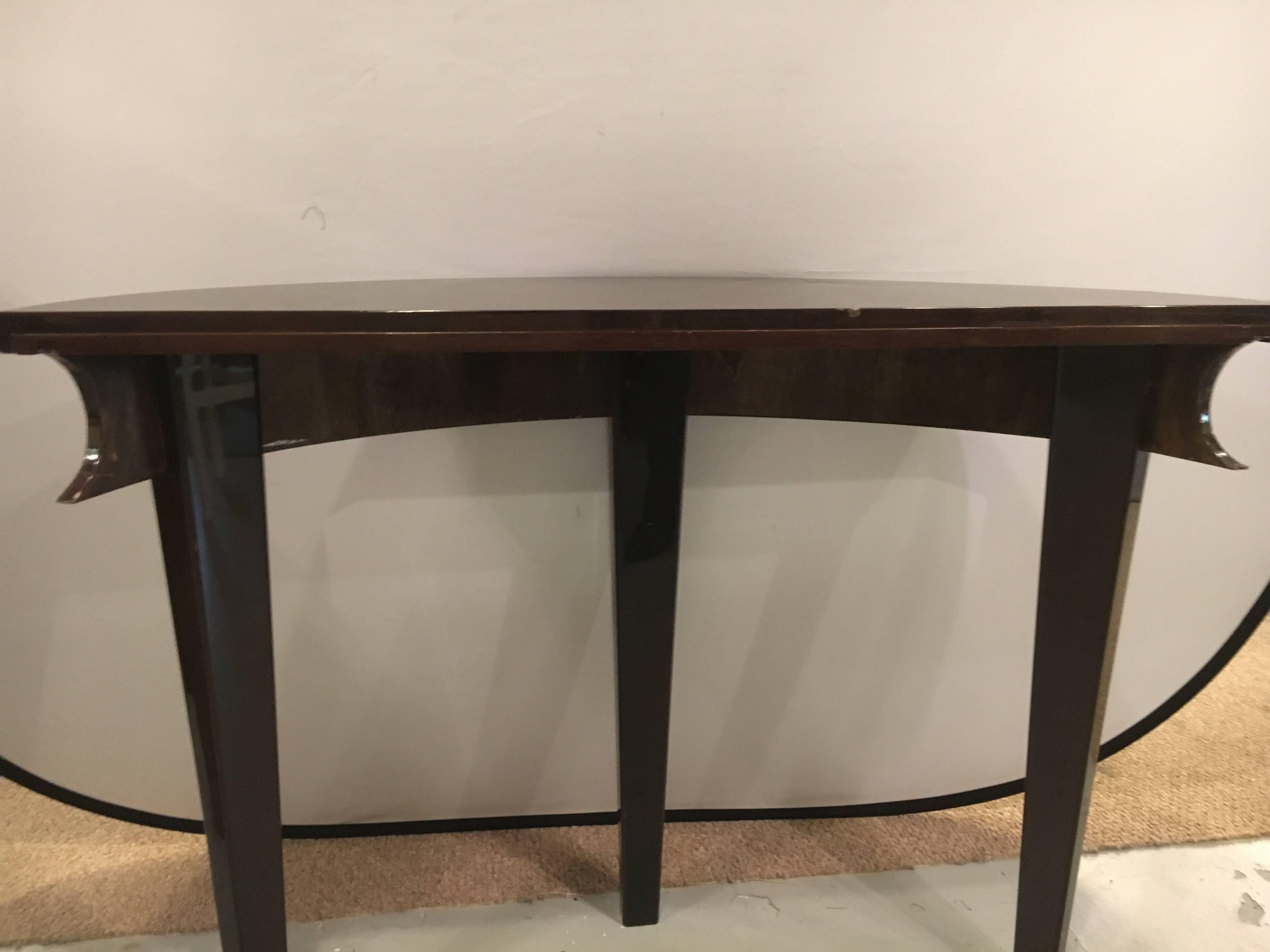 Pair of Hollywood Regency Parzinger Style Ebony Mahogany Demilune Console Table In Good Condition In Stamford, CT