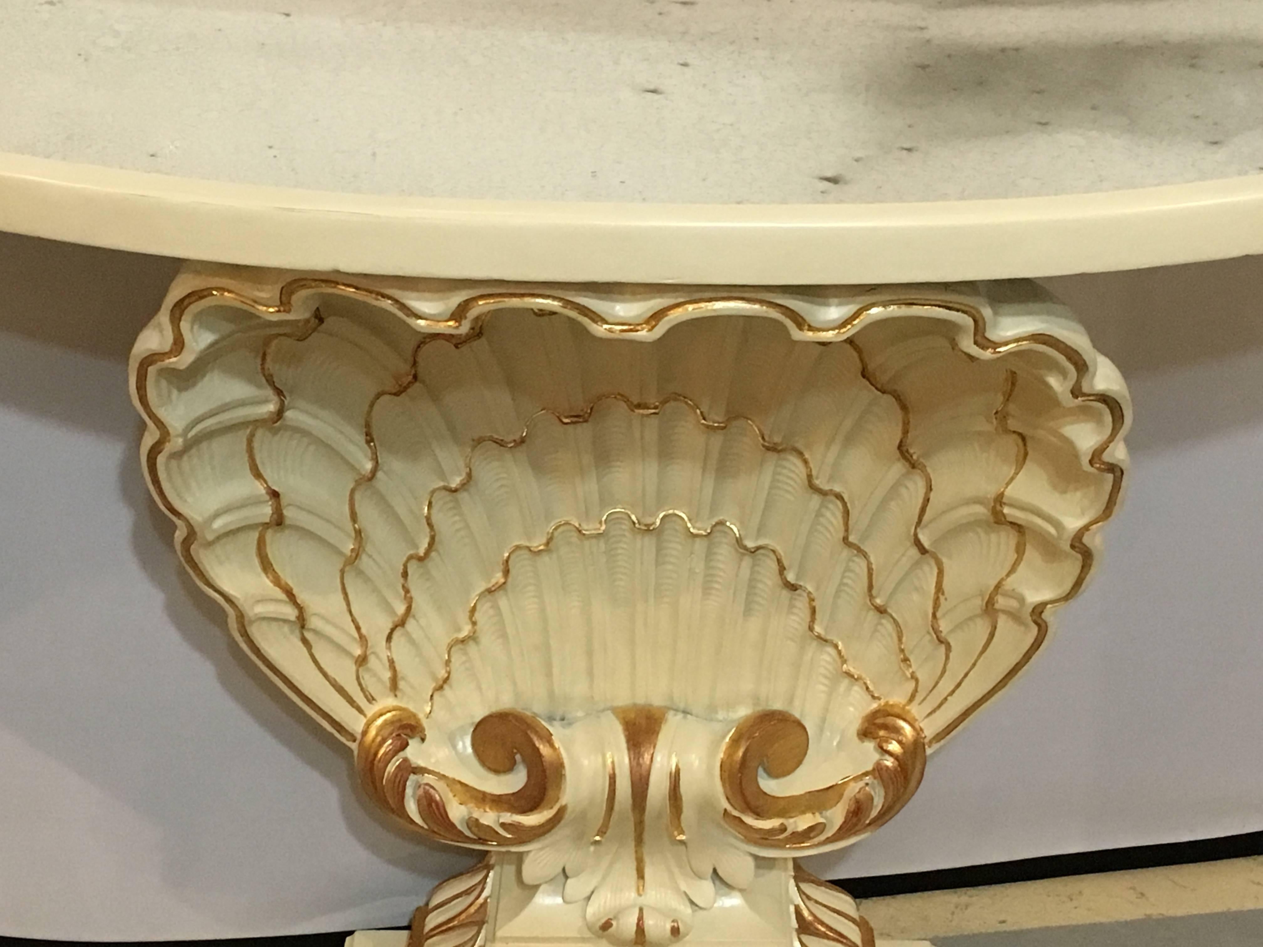 French Pair of Jansen Shell Form White and Parcel-Gilt Demilune Consoles