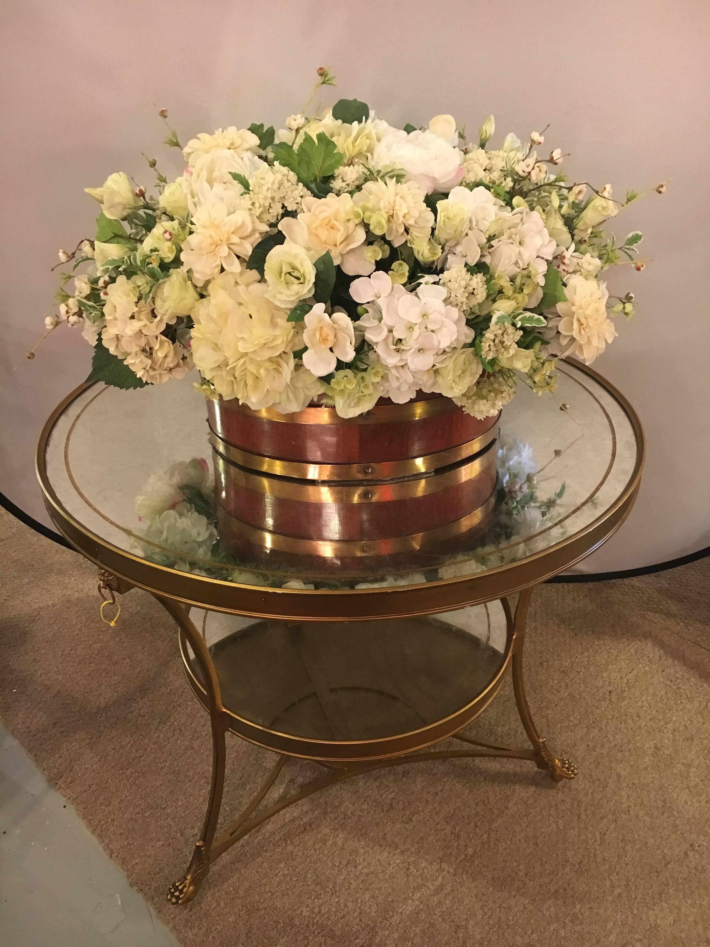Gilt based églomisé and mirror top gueridon centre table. This wonderfully stylish and desirable centre table has the flair of a very expensive piece with a price that anyone can afford. This table has been marked down due to a professionally