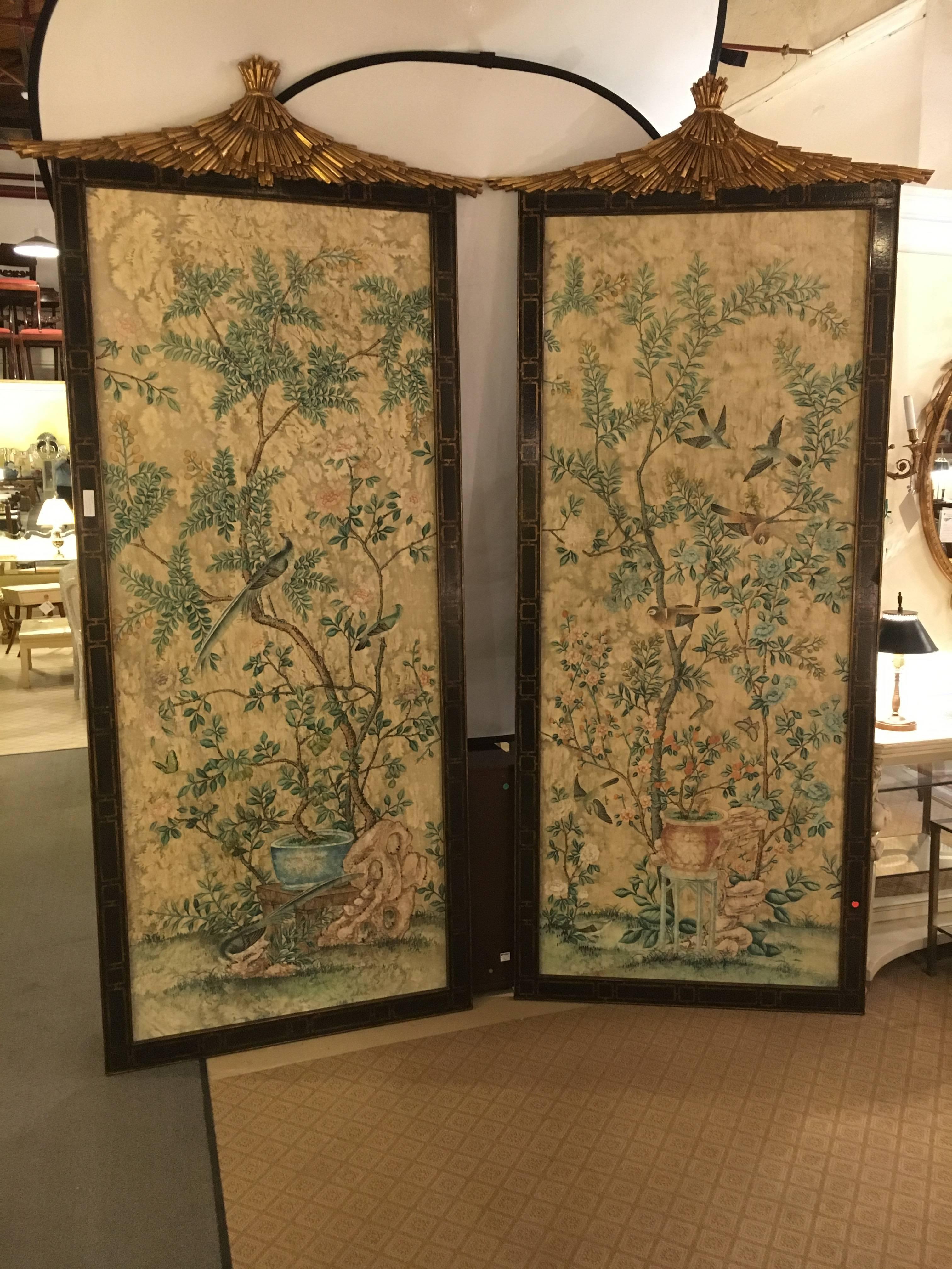 Pair of monumental Chinoiserie wall panels with gilt pagoda giltwood tops each bearing the Dessin Fournir label. This fine pair of outstanding wall panels stand over eight feet tall and four feet wild. Having opposing scenes of birds perched on the