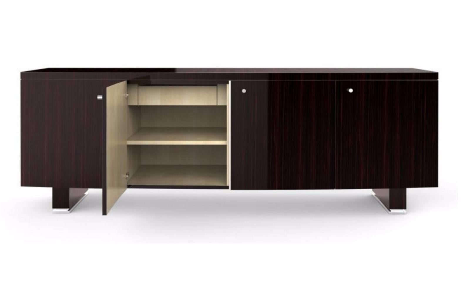 Monumental 10 feet long sideboard by Dakota Jackson. Intelion French polished Macassar credenza of modernist form. Four-door bowed front cabinet sits on square legs and silver chrome feet. Retails at 25,000. This piece is part of a recently acquired
