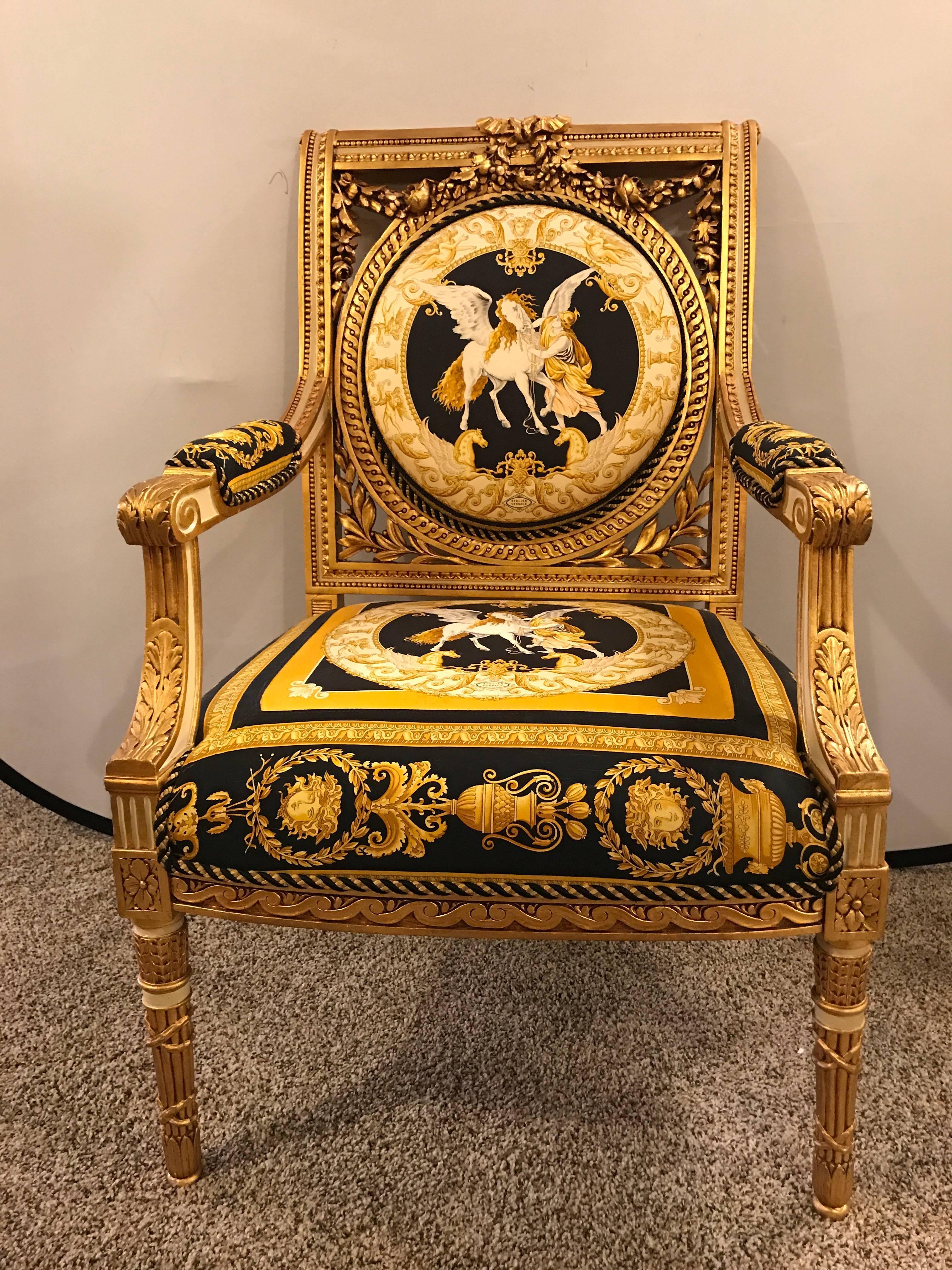 Custom Versace Louis XVI style armchair vintage 1980s. In a gilt gold design with fabric that simply screams Versace this fine armchair is not only sleek and stylish but comfortable.