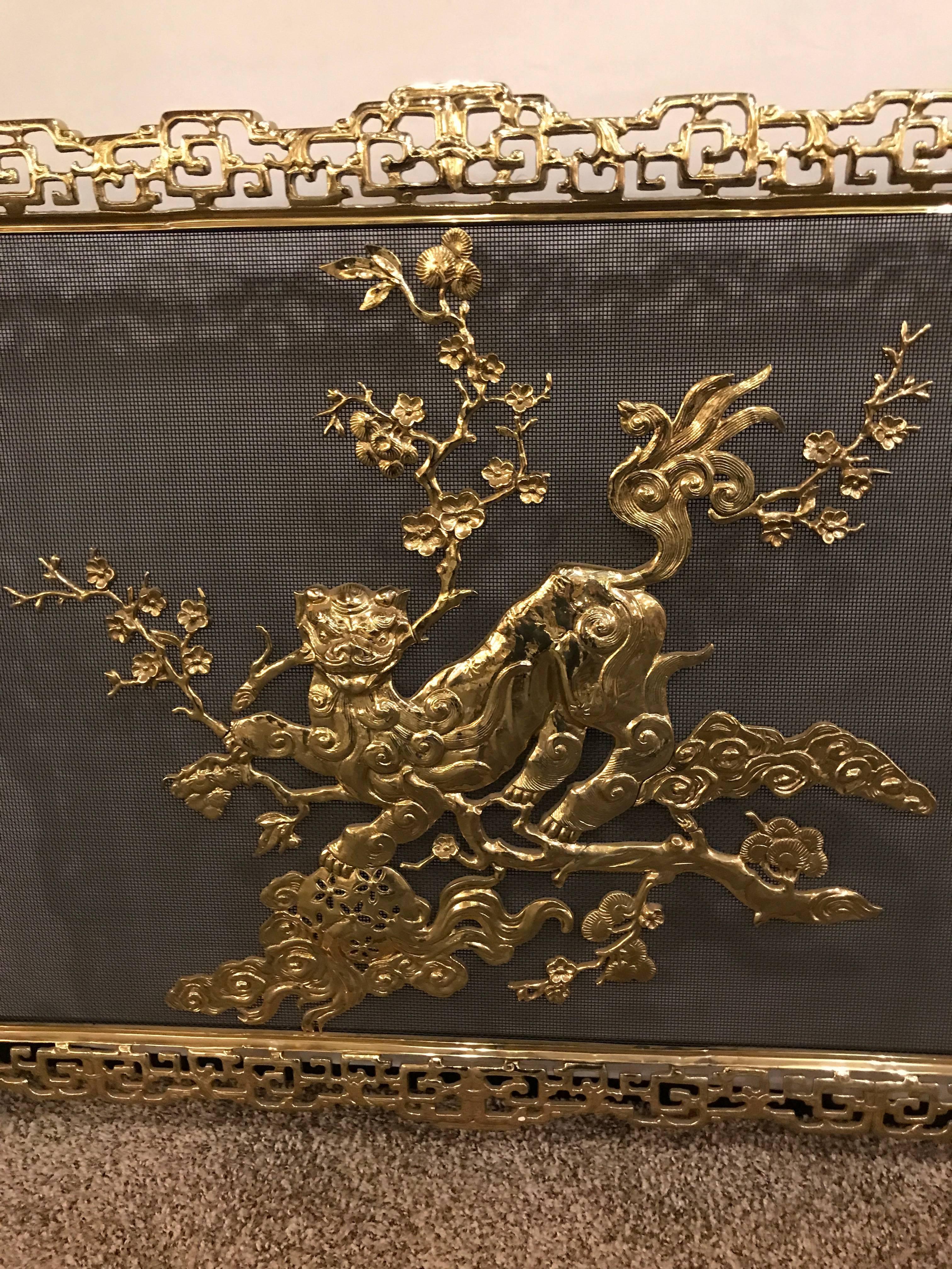 19th century French bronze in chinoiserie pattern fire screen. This large and impressive fire screen is solid bronze and is certain to add style and flair to any fireplace.