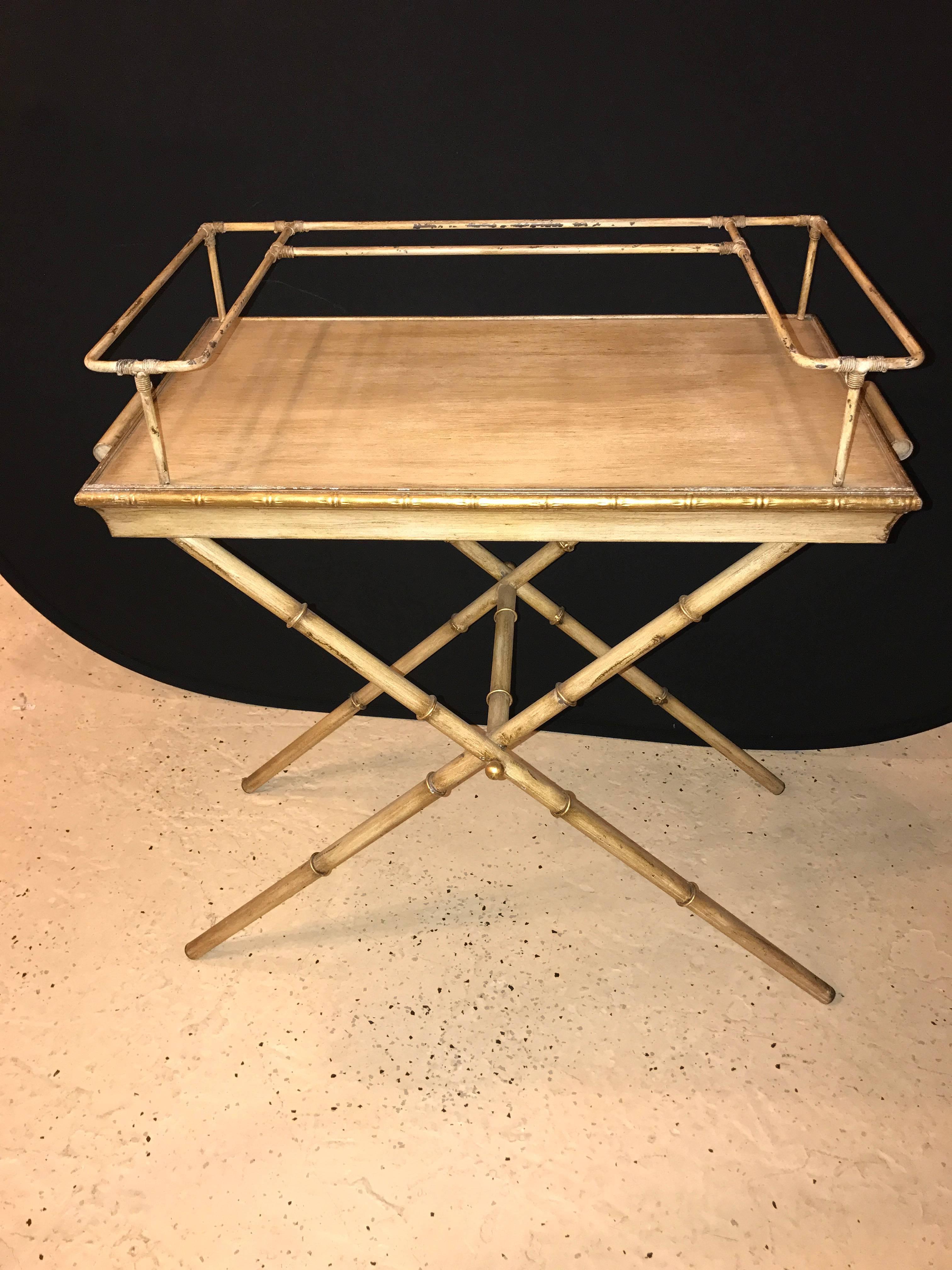 Indoor outdoor bamboo form serving tray on stand. Screaming poolside come this distressed bamboo form folding stand with removable twin handled tray top.