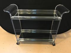 Hollywood Regency Style Two-Tier Lucite and Mirrored Shelf Rolling Bar Cart