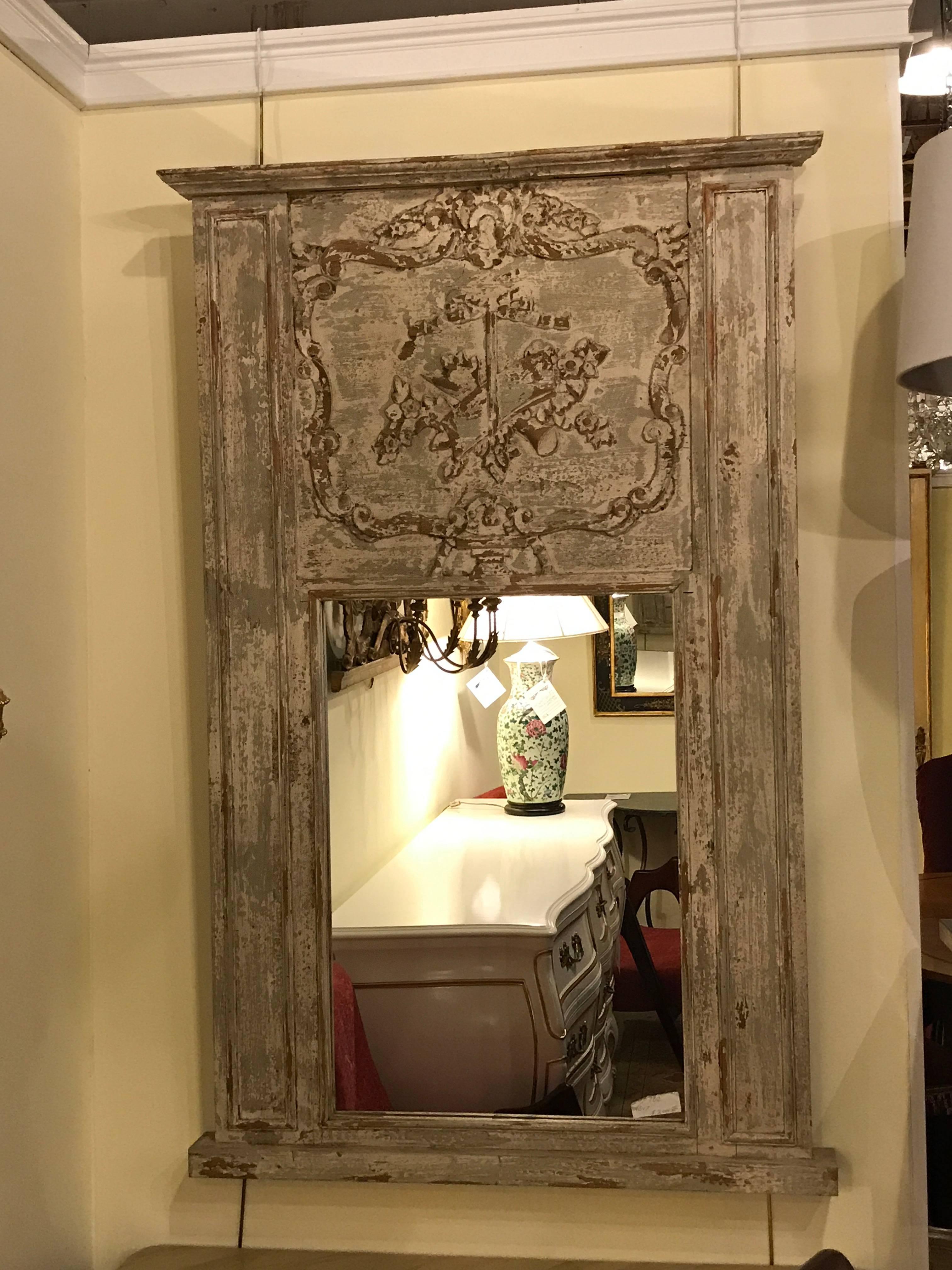 Gustavian Style mirror. Finely carved and highly distressed wall or console mirror in a Swedish finish.
 