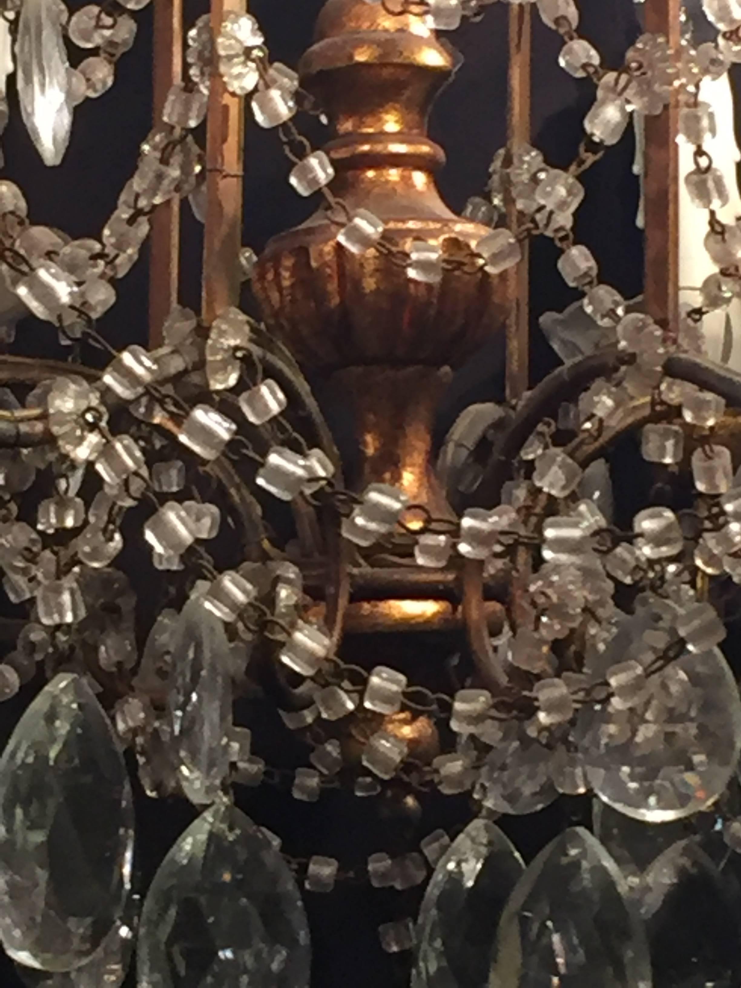 Rococo Pair of 1920s Crystal and Gilded Wood Italian Chandeliers