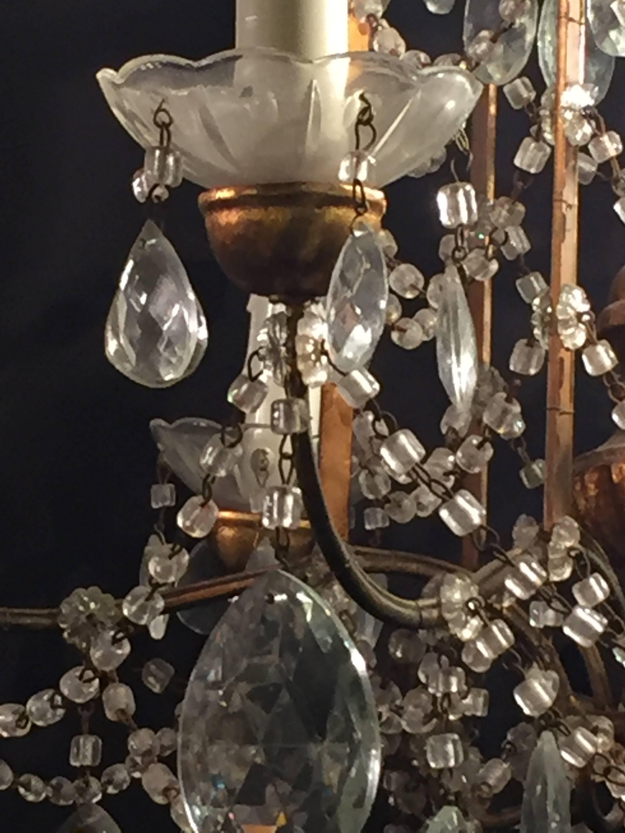 Pair of 1920s Crystal and Gilded Wood Italian Chandeliers 1