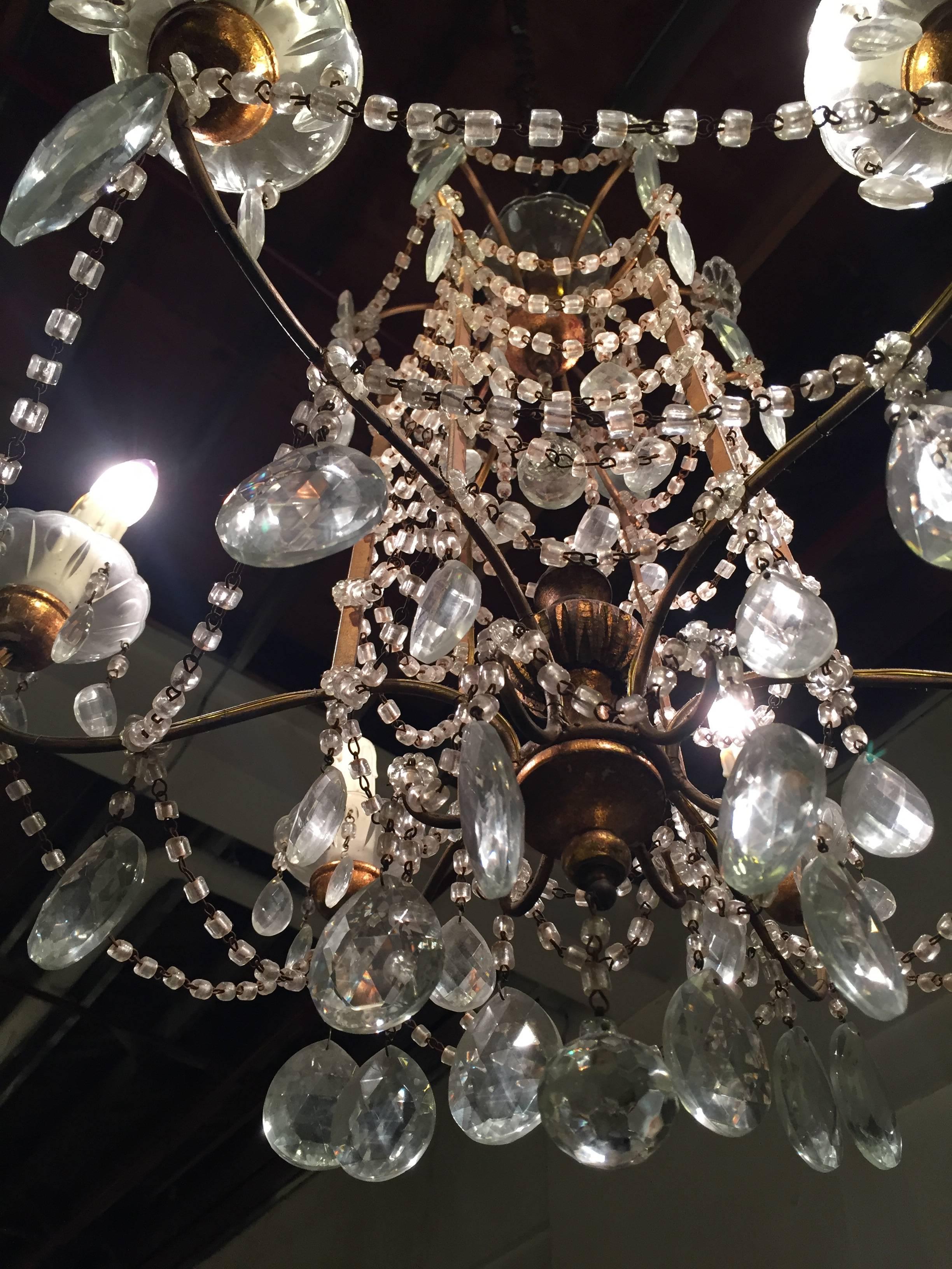 Pair of 1920s Crystal and Gilded Wood Italian Chandeliers 4
