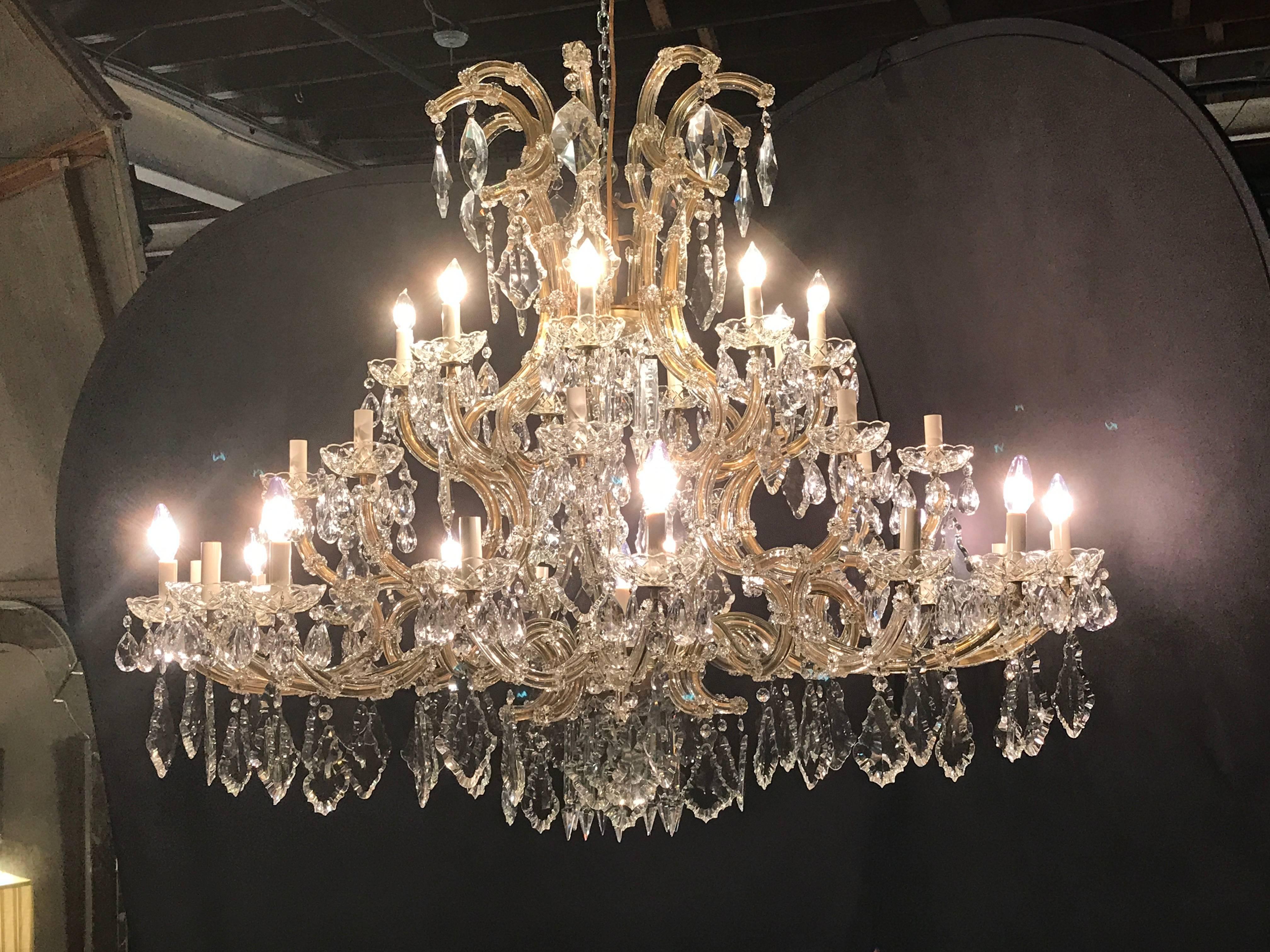 Monumental antique Venetian chandelier having 41 lights. This palatial chandelier is sure to light up any foyer or dining table that can withstand the grander of the size, late 19th or early 20th century chandelier is in very nice condition with