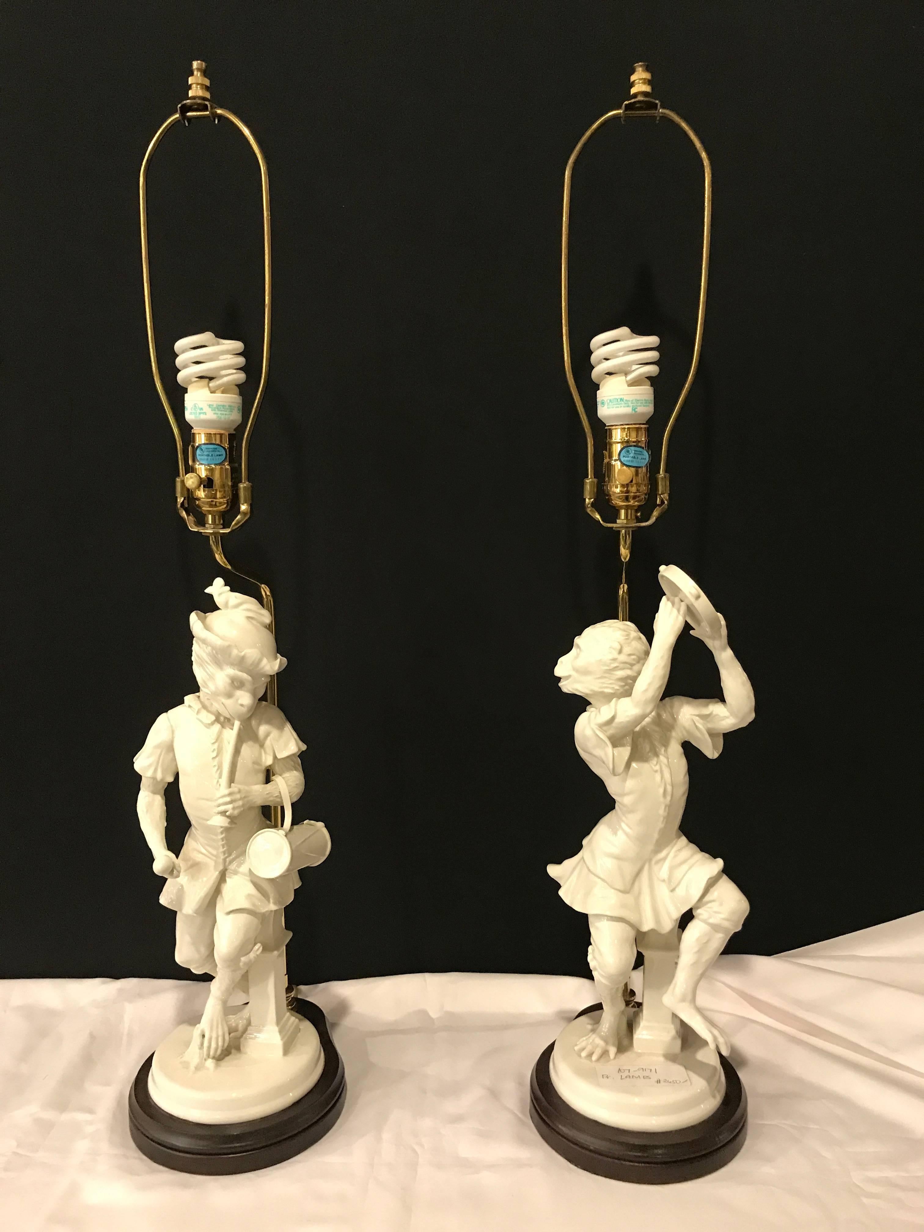 20th Century Pair of White Porcelain Opposing Monkey Lamps