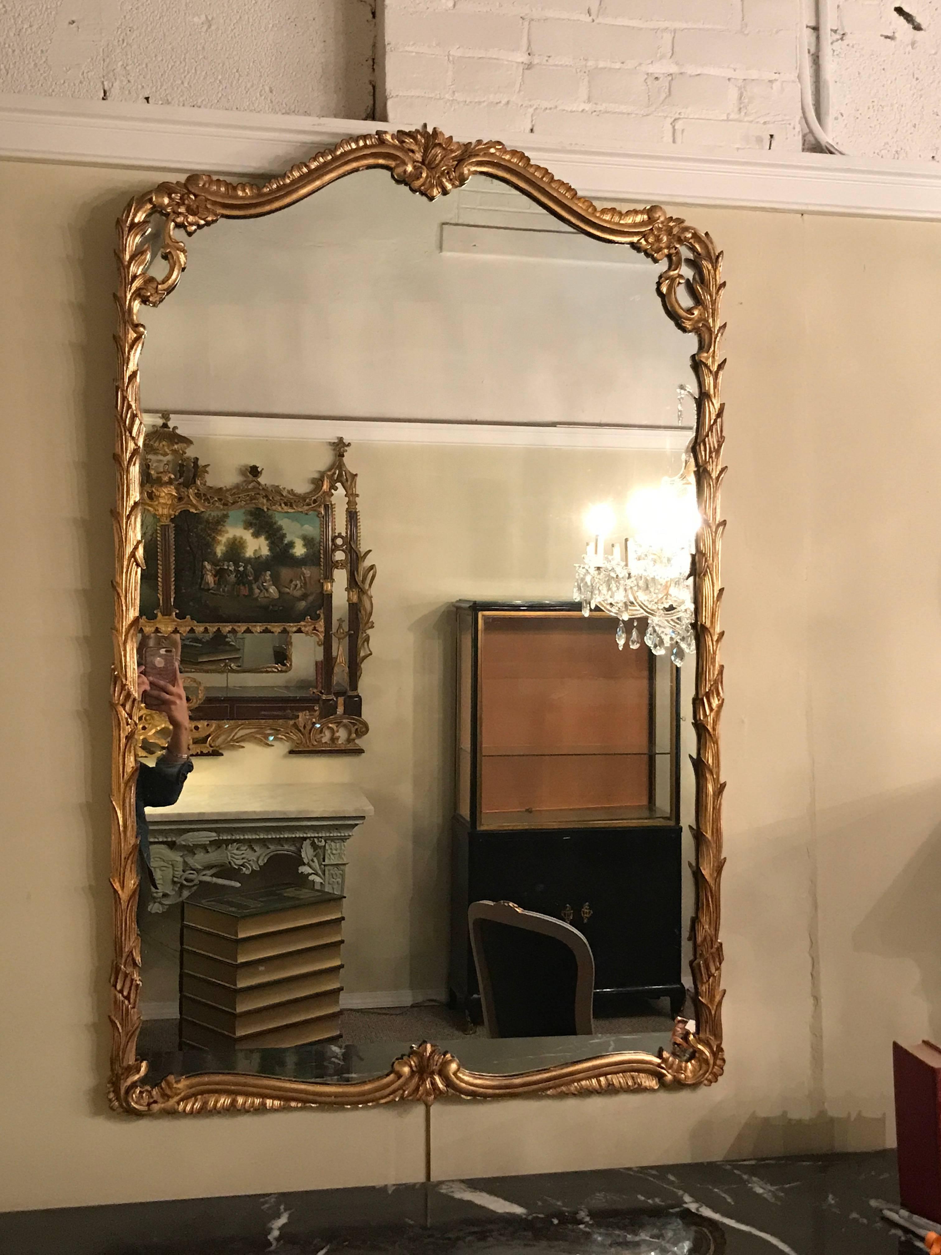 Pair of Monumental Giltwood Carved Wall or Console Mirrors 1