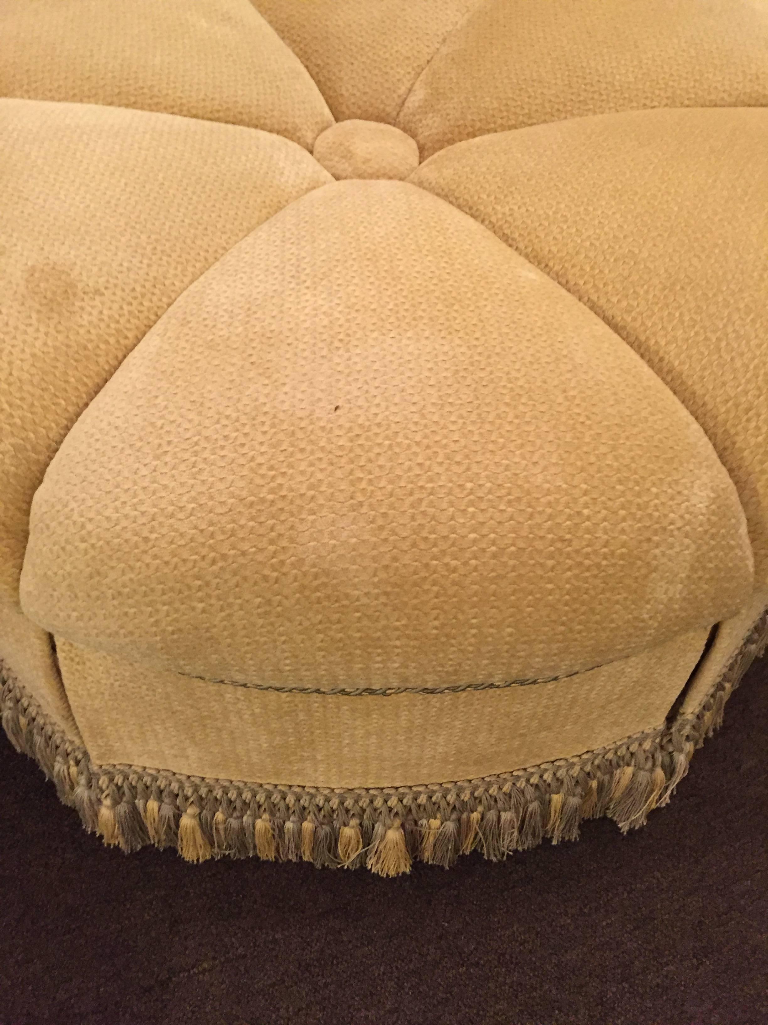 20th Century Circular Finely Upholstered and Lined Ottoman or Poof with a Tassel Fringe Base