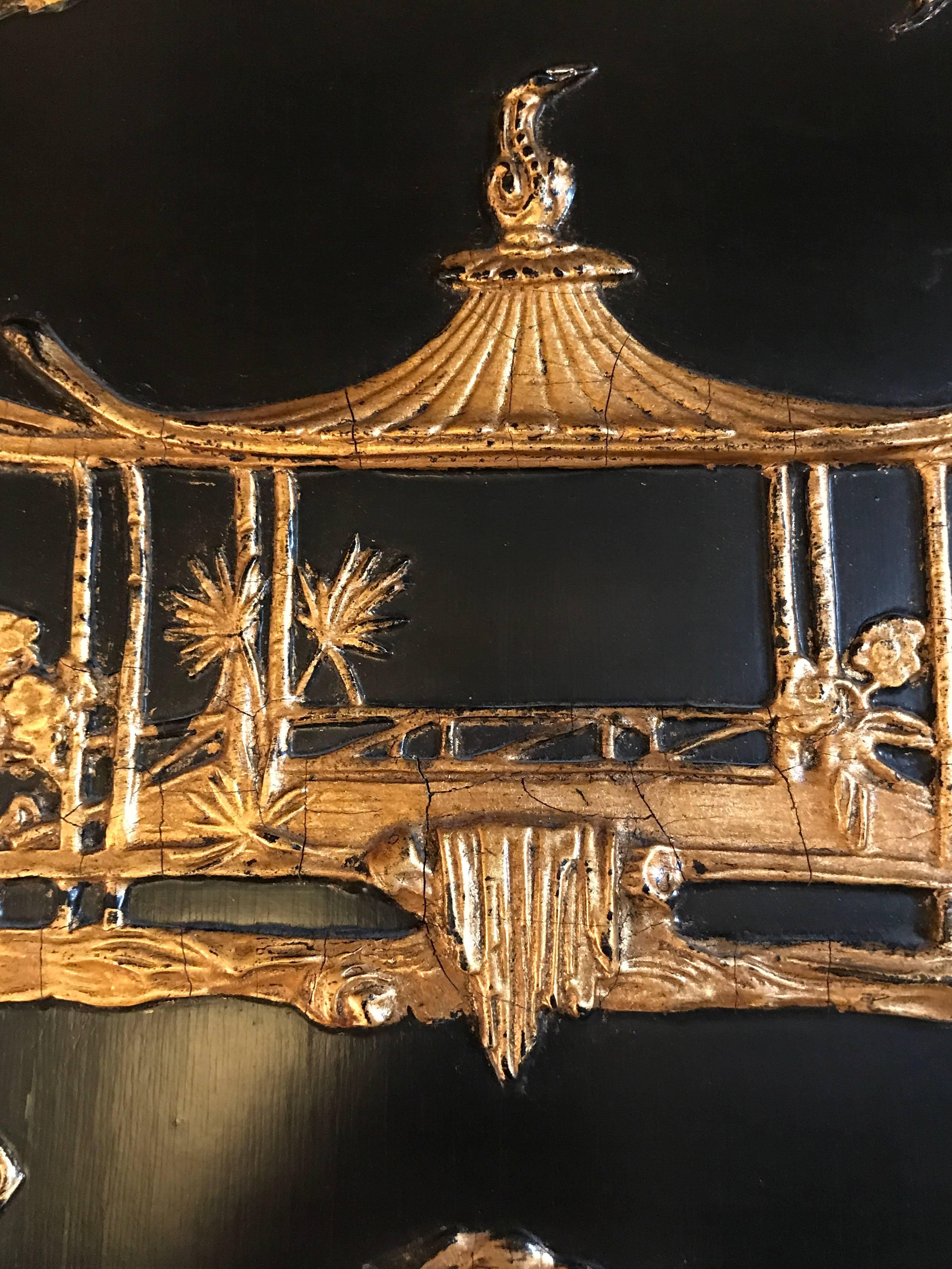 Chinese Export Chinoiserie Style Gilt and Ebony Decorated Beveled Wall or Console Mirror