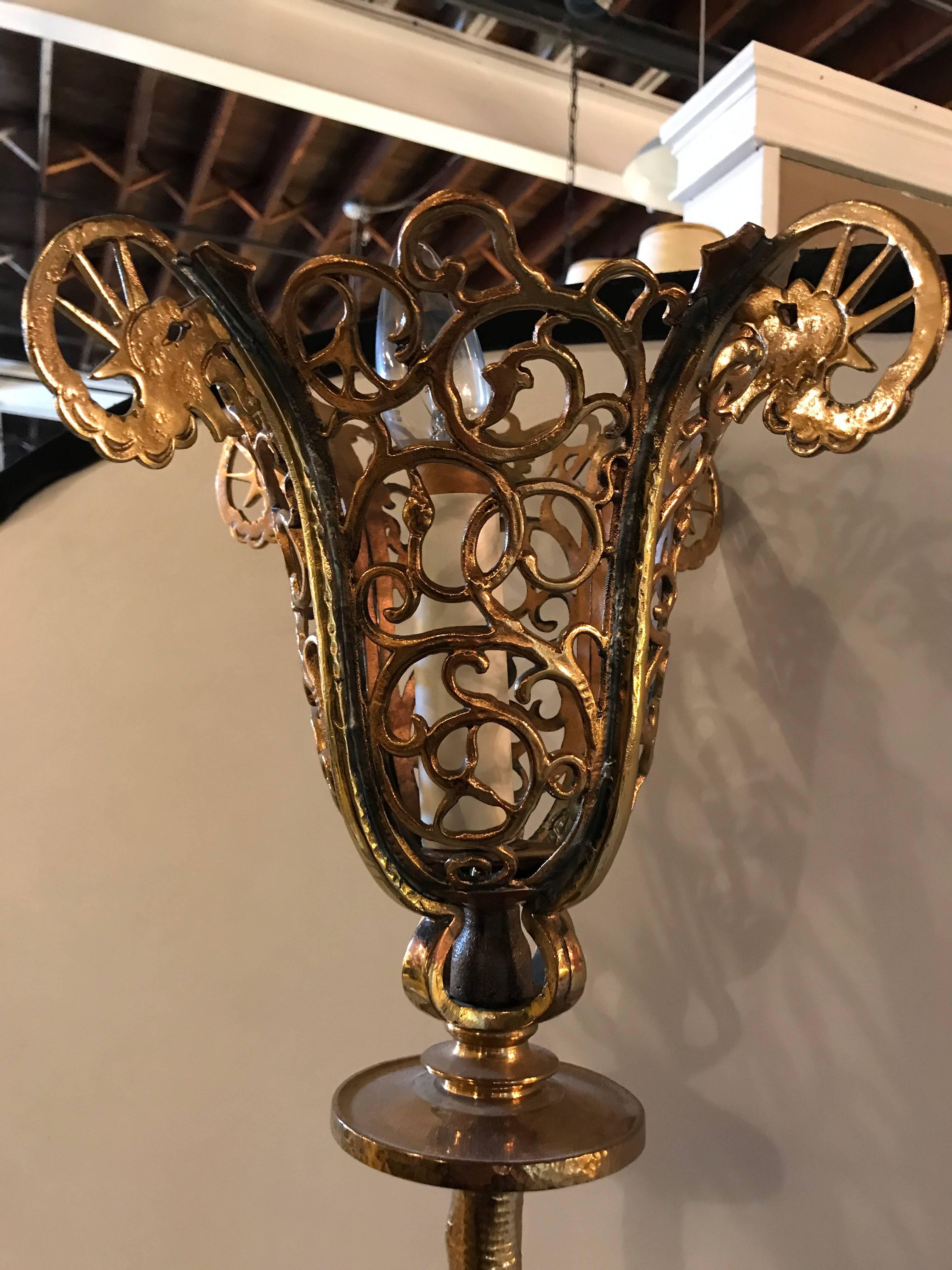 Art Deco bronze torchiere standing lamp. Hollywood Regency style with scroll and leaf design taking one bulb.