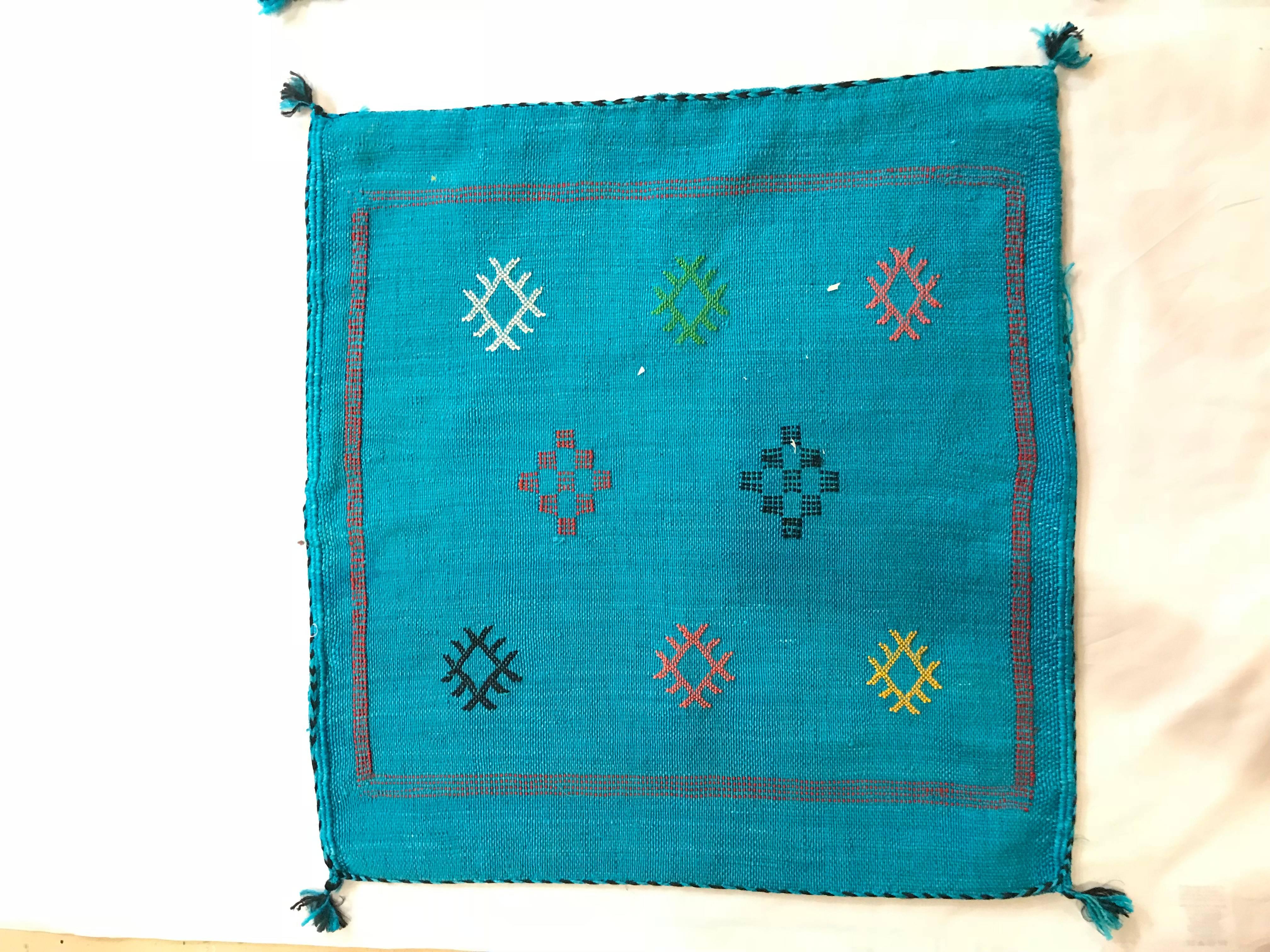 Pair of Moroccan hand-loomed blue wool pillowcase.
Hand-loomed pair of pillow cases from the Atlas Mountains. Featuring Berber tribal original design, this pair is made of a mix of sheep and goat wool with all natural organic dyes.
 