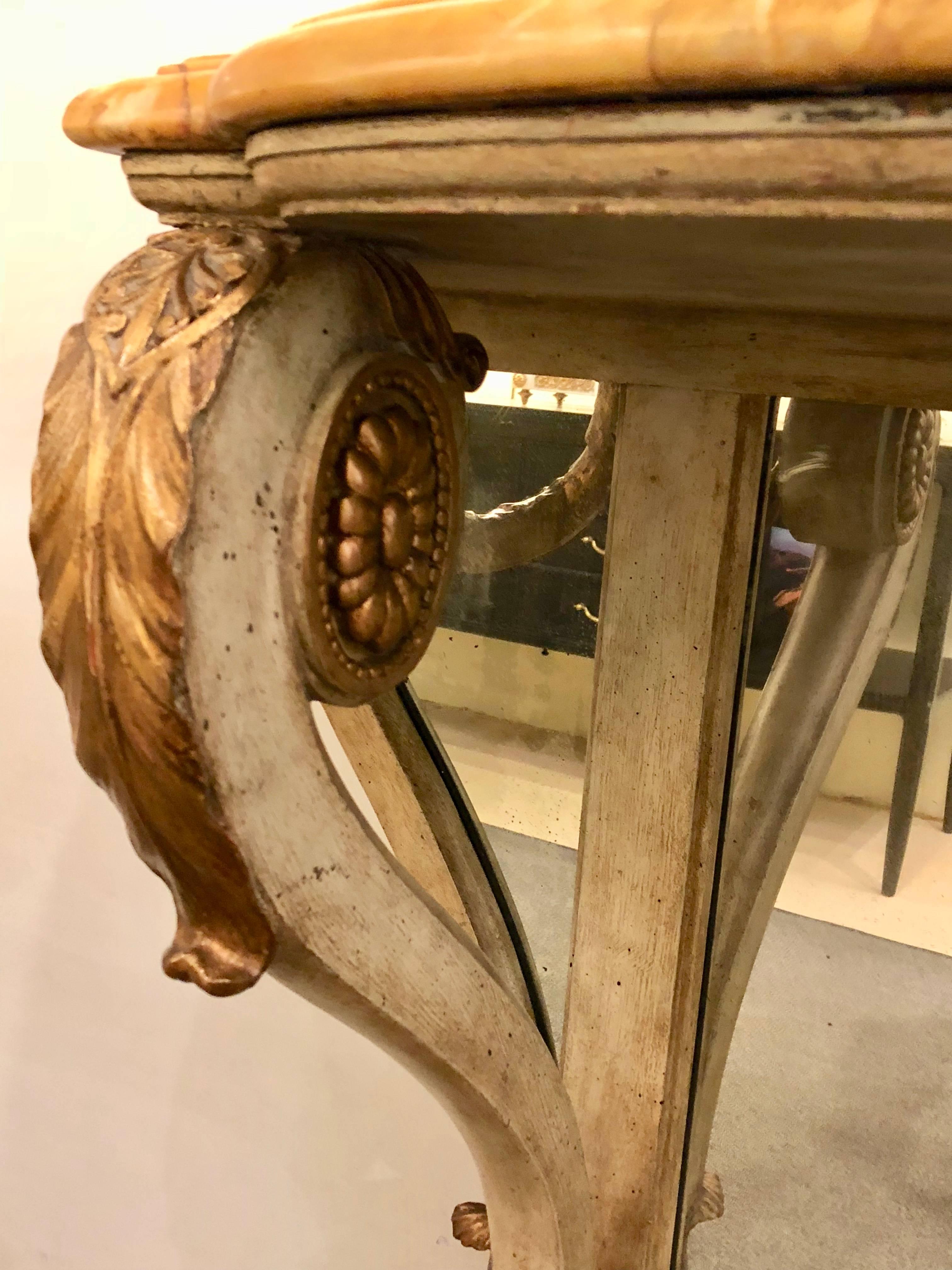 19th Century Neoclassical Style Marble-Top Bowed Table Mirrored Back Gilded Dolphin Accents For Sale