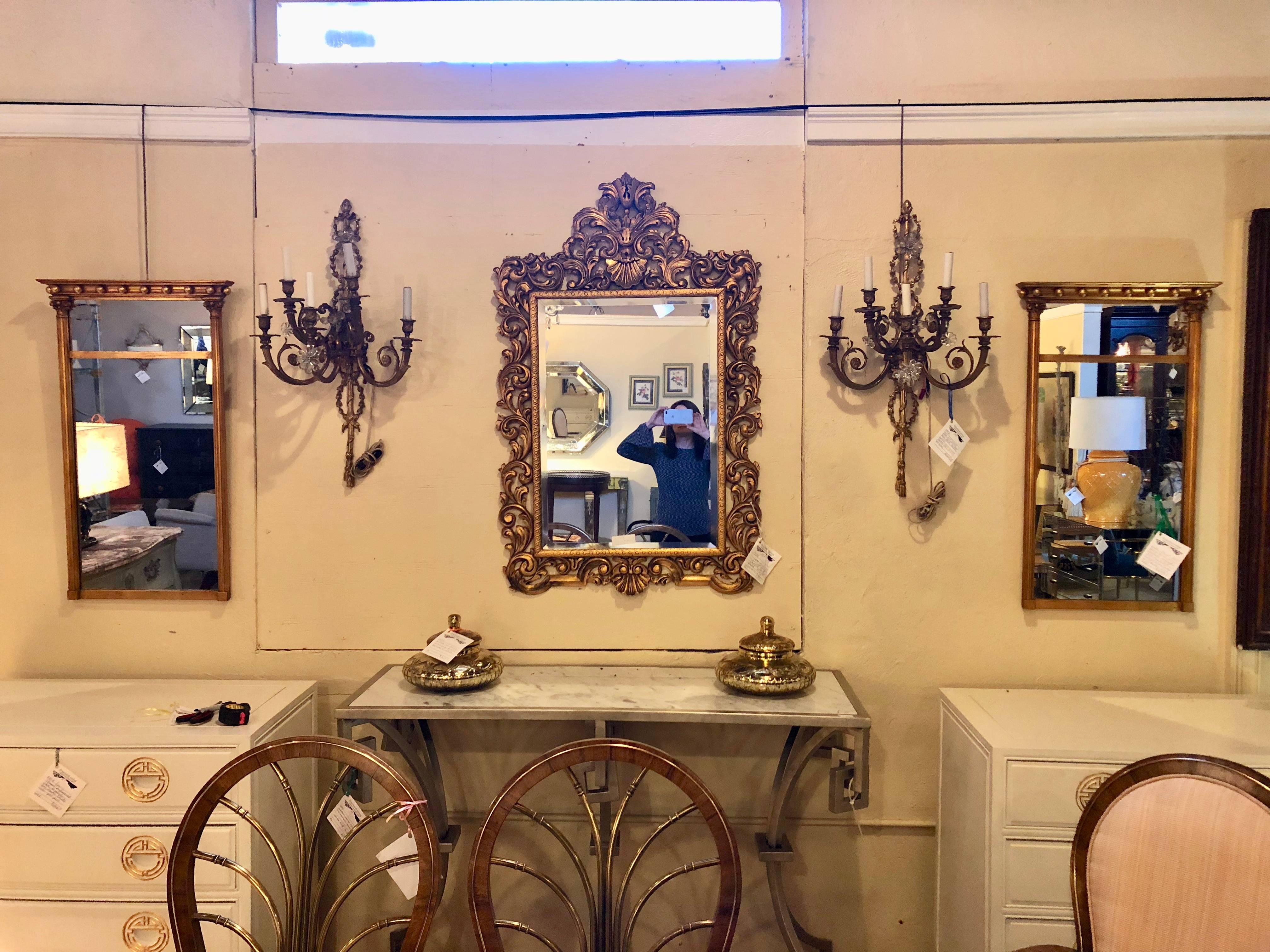 Pair of Gilt Gold Wall or Console Mirrors with Column Form Sides and Carved Tops 4