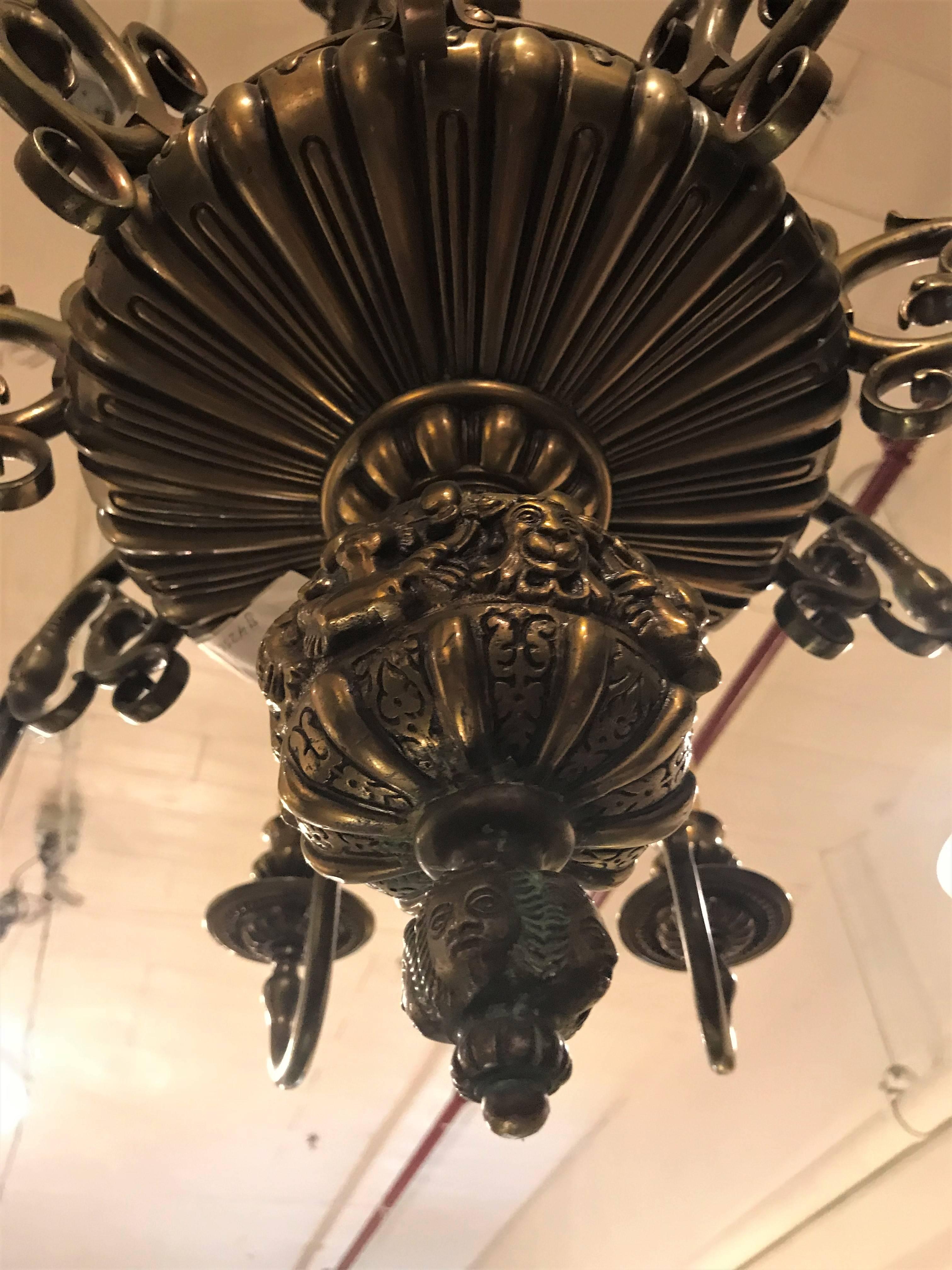 Nine-Arm Renaissance Style Cast Repousse Design Large Bronze Chandelier In Good Condition In Stamford, CT
