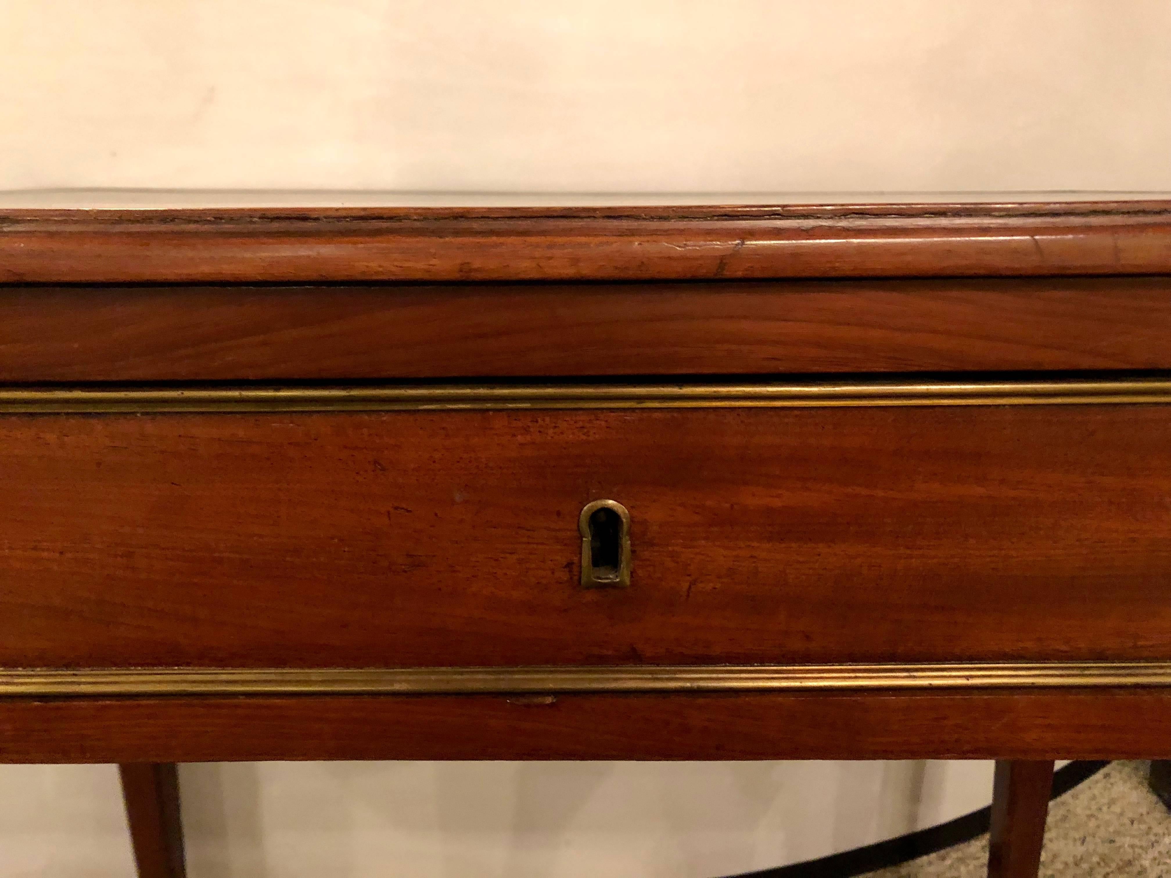 French Diminutive Leather Top Desk with Pull-Out Sides and Bronze Mounts Stamped Jansen For Sale