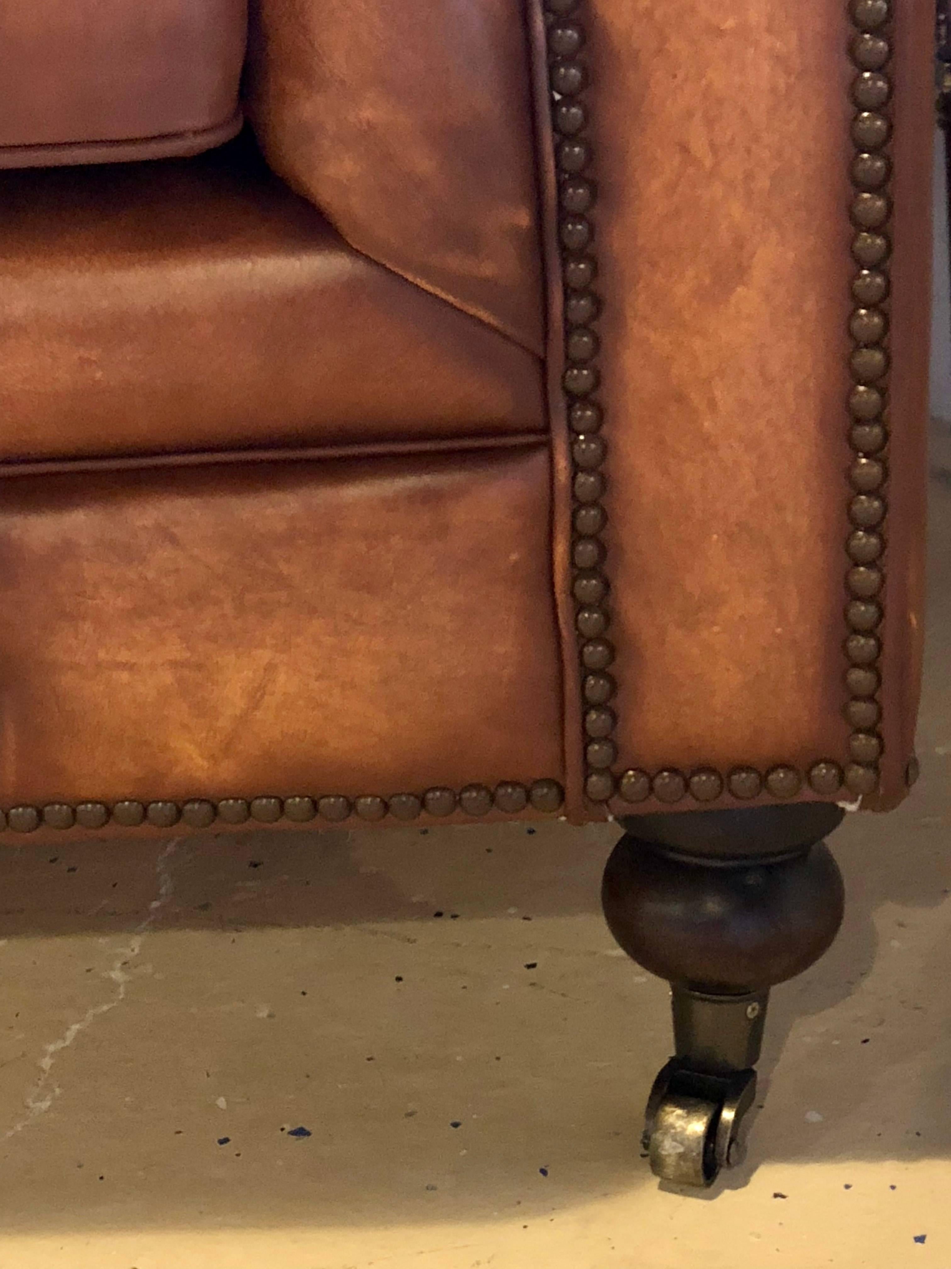worn chesterfield sofa