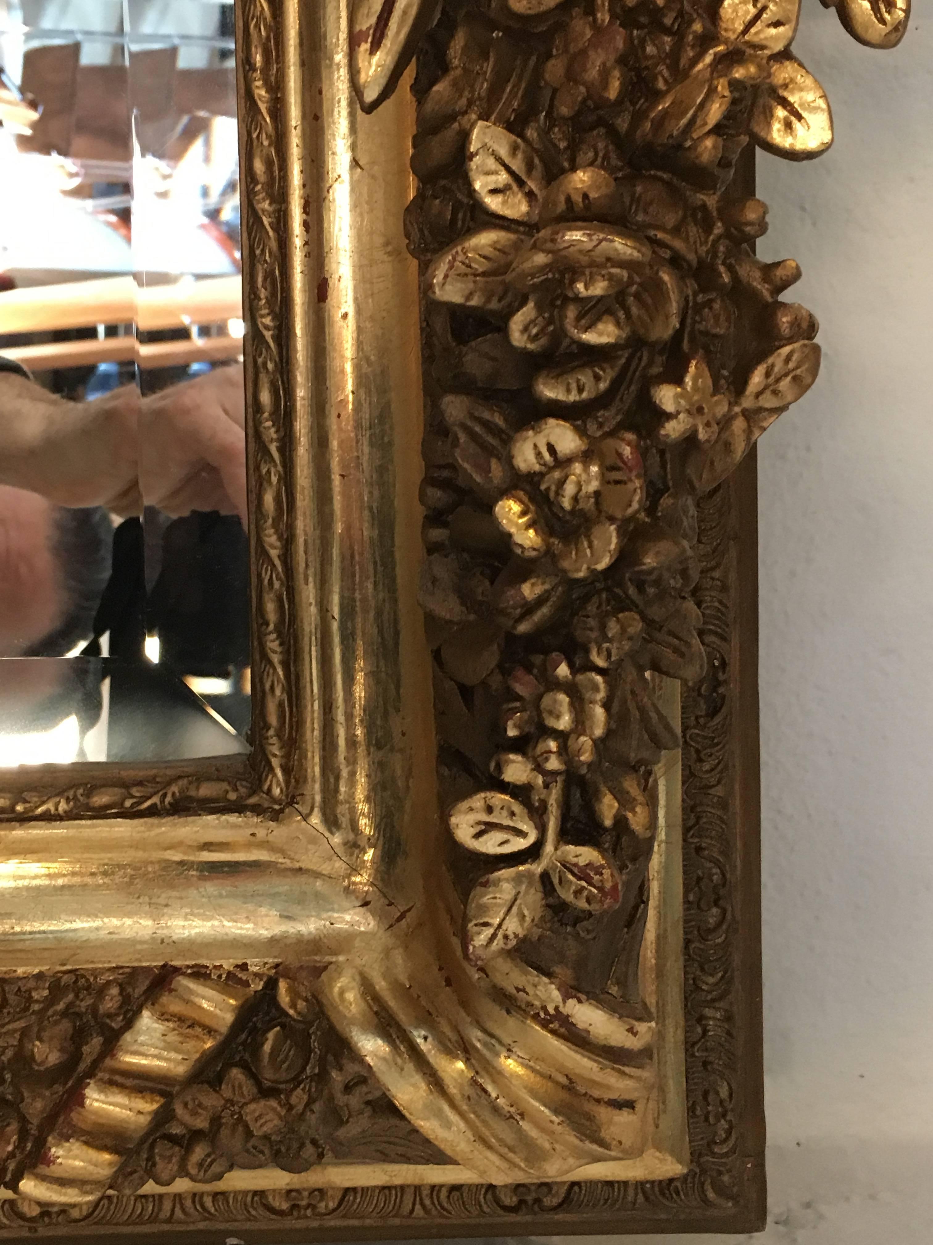 20th Century Pair Of Gilt Gesso and Wood Ribbon Tassel Rose Carved Mirrors 