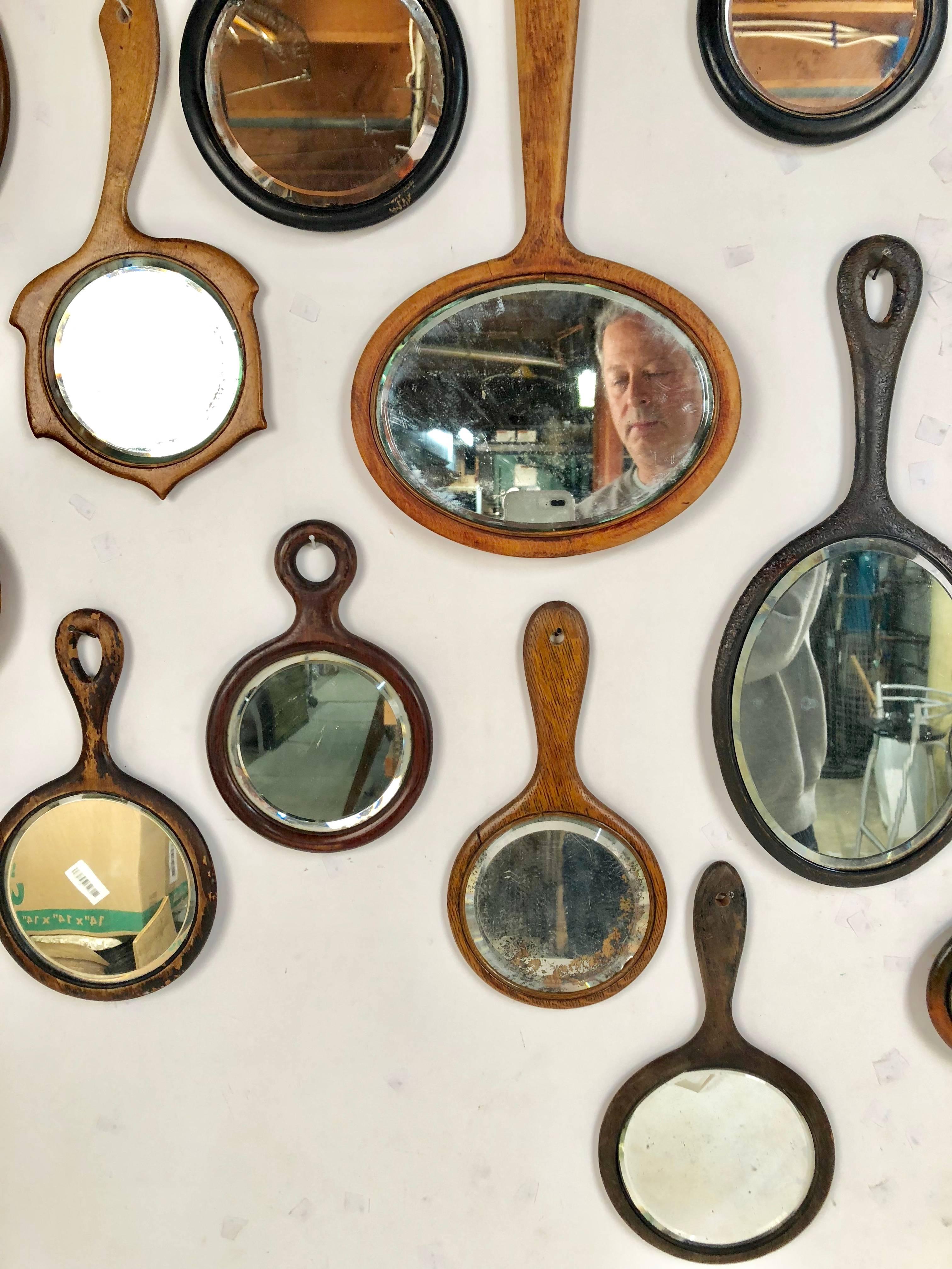 Collection of 18 Antique Wooden Handle Bevelled Glass Hand Mirrors In Good Condition In Stamford, CT