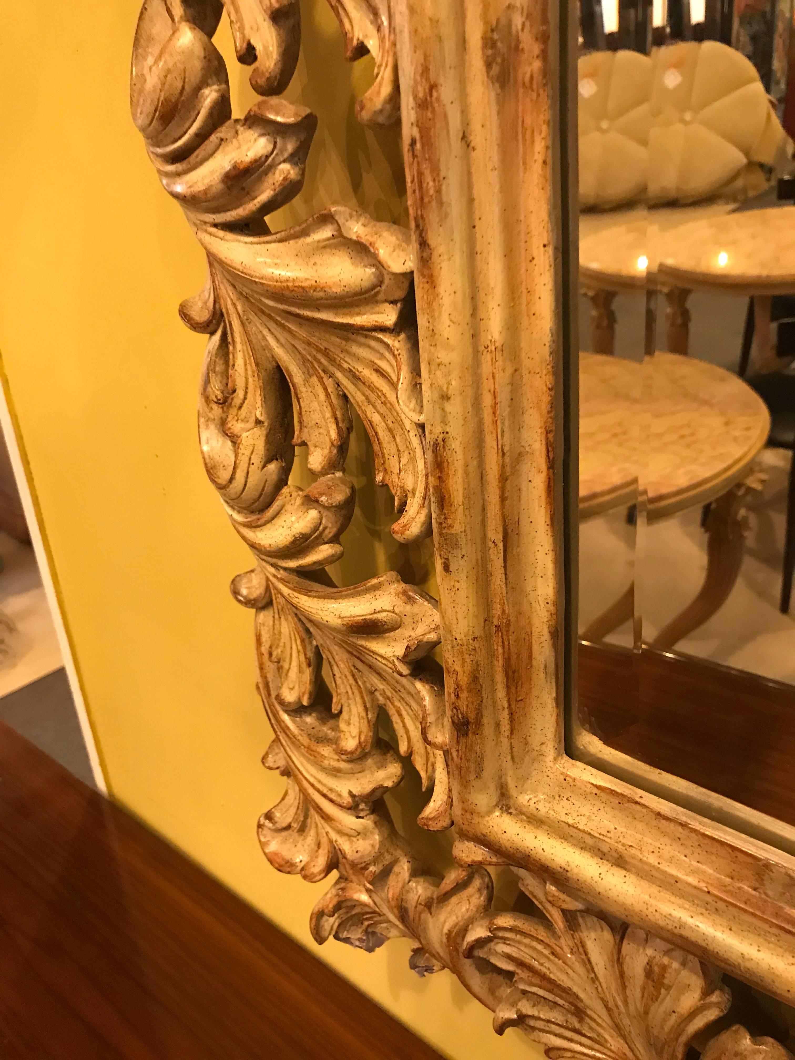 Heavily Carved French Frame Flanking a Bevelled Glass Wall or Console Mirror In Good Condition For Sale In Stamford, CT