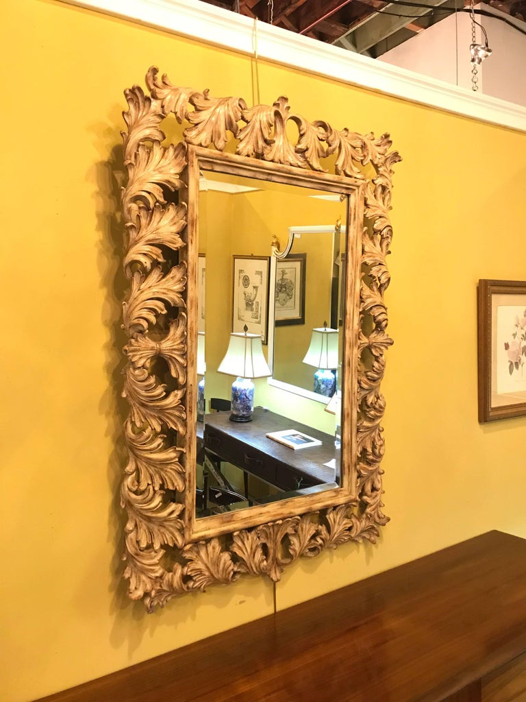 Heavily Carved French Frame Flanking a Bevelled Glass Wall or Console Mirror For Sale at 1stDibs