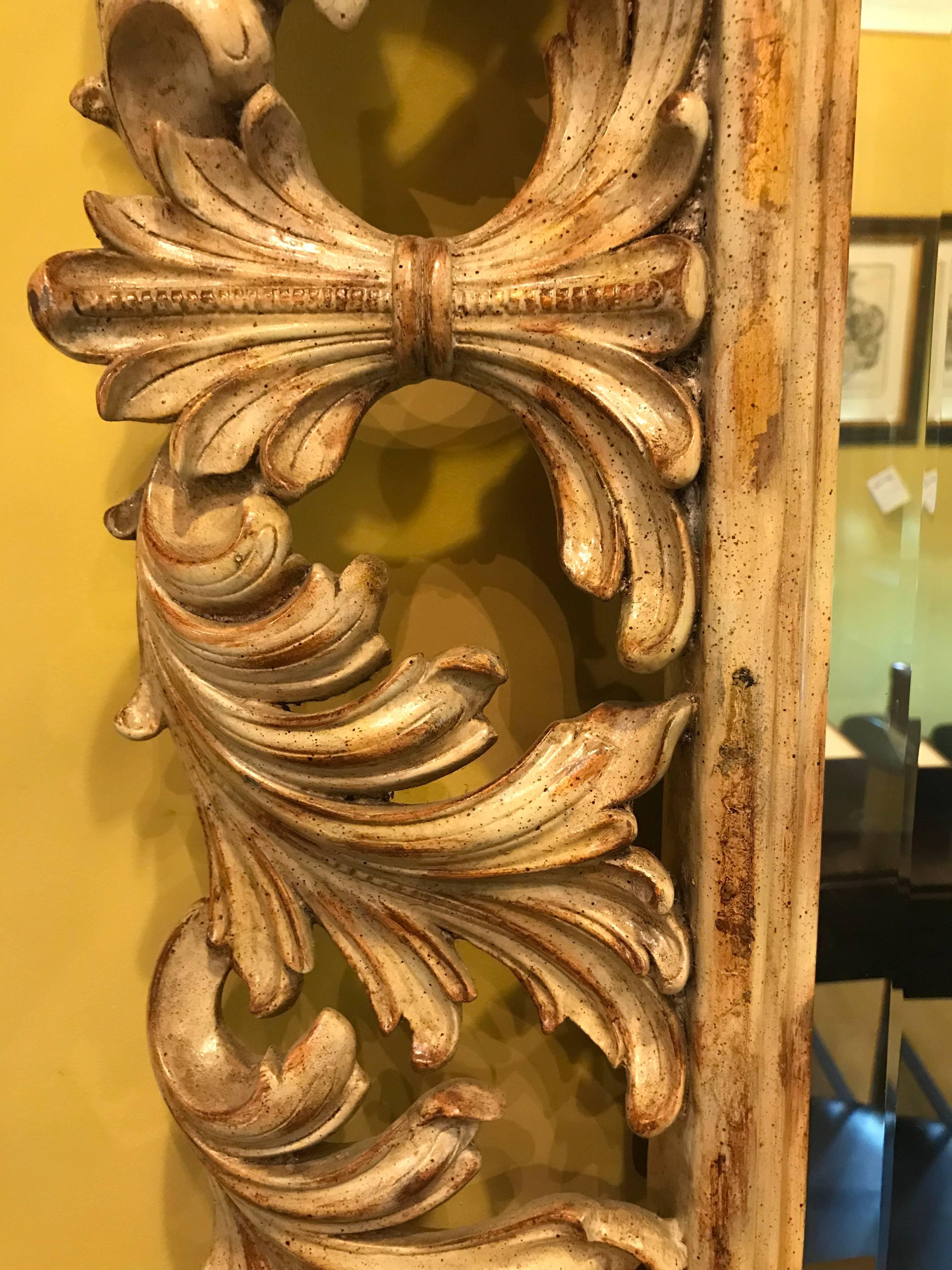 Wood Heavily Carved French Frame Flanking a Bevelled Glass Wall or Console Mirror For Sale