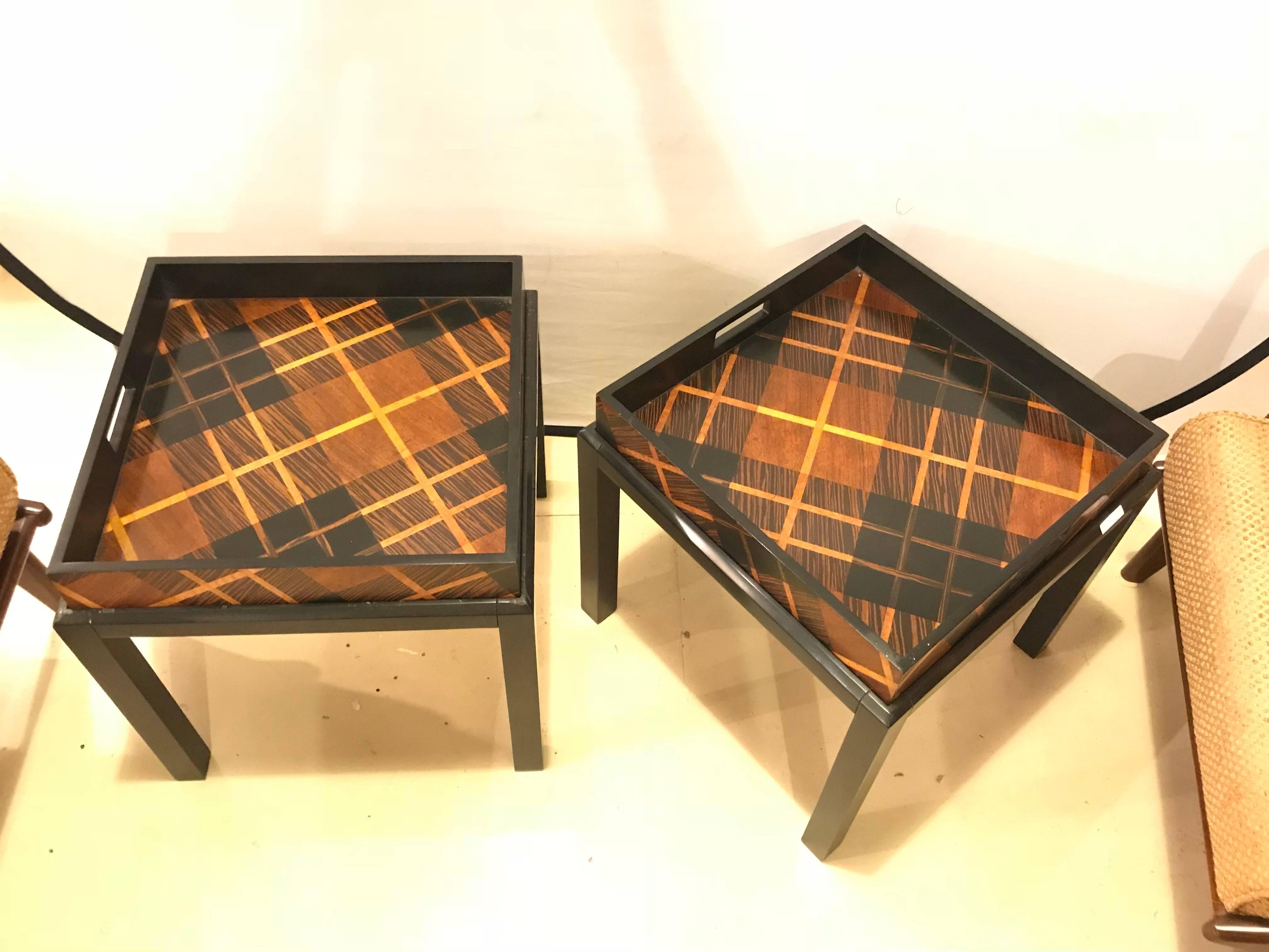 A pair of Jonathan Charles hand inlaid butler's table. Fashionable and flexible. These hand inlaid tartan tray tables literally serve their master with style and panache.