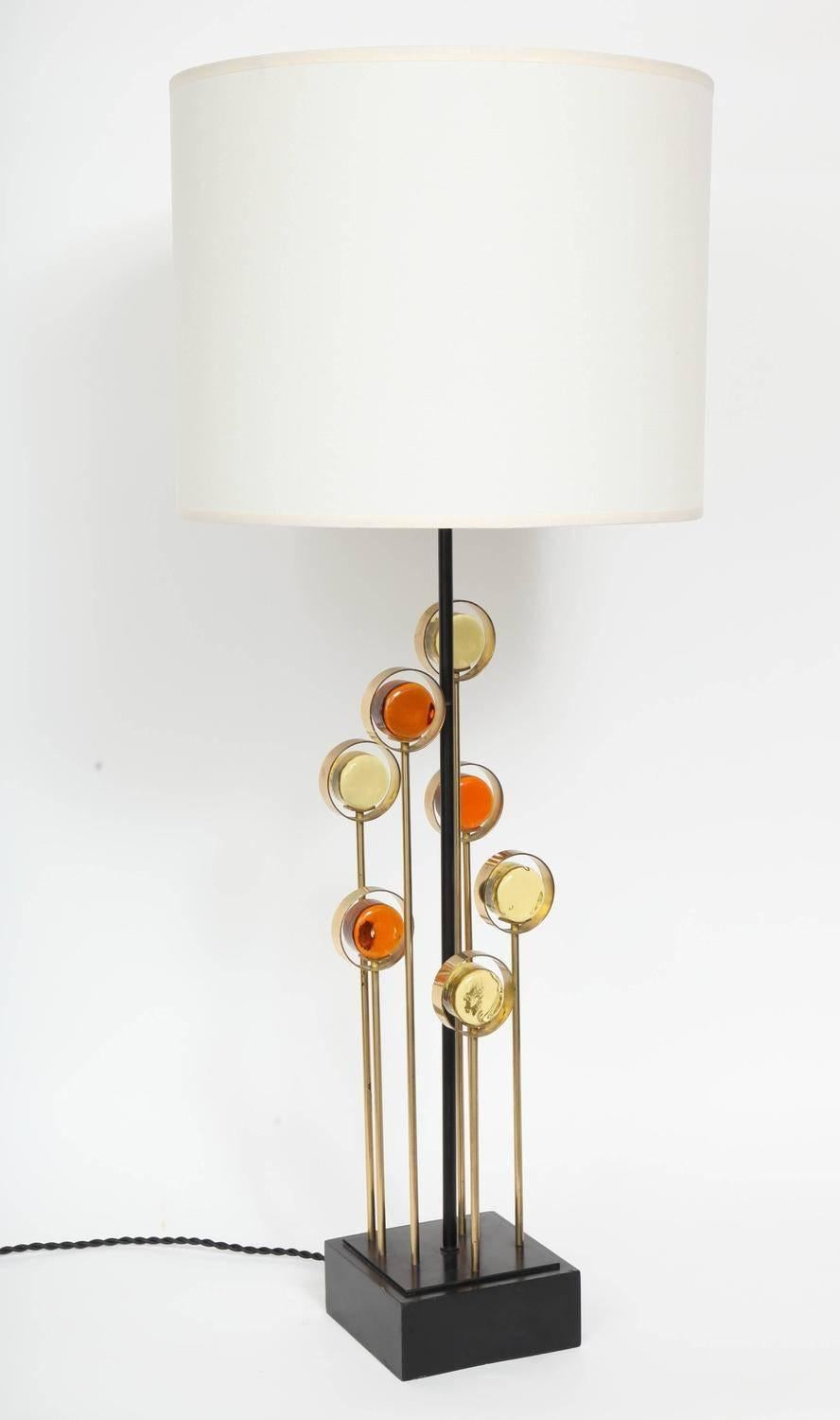 Table Lamp designed by Svend Aage manufactured for Holm Sorensen & Co. made of a wrought iron and brass frame. It's decorated with orange and yellow glass circles mounted on square black lacquered wood base and has a new custom linen shade.