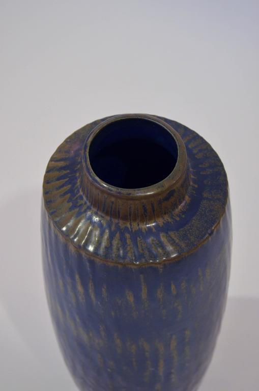 Mid Century ceramic artist Gunnar Nylund's Glazed Stoneware Vase made for Rörstrand, circa 1950s. Incised signature and studio mark to underside: [R Rubus GN Sweden 9].

Image 7: Gunnar Nylund with Carl-Harry Stålhane at Rörstrand.

About the